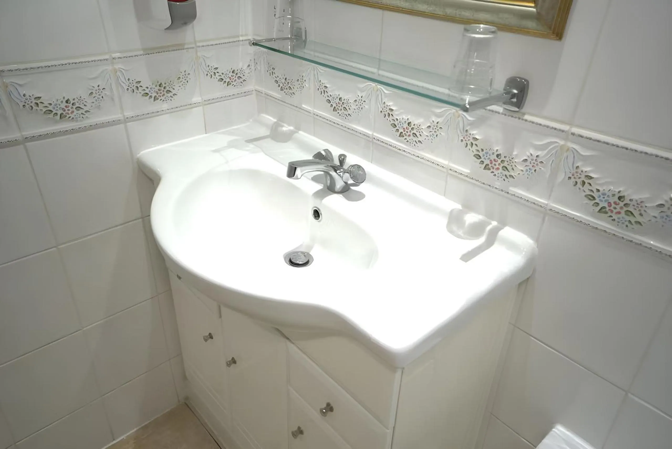 Toilet in Consort Hotel