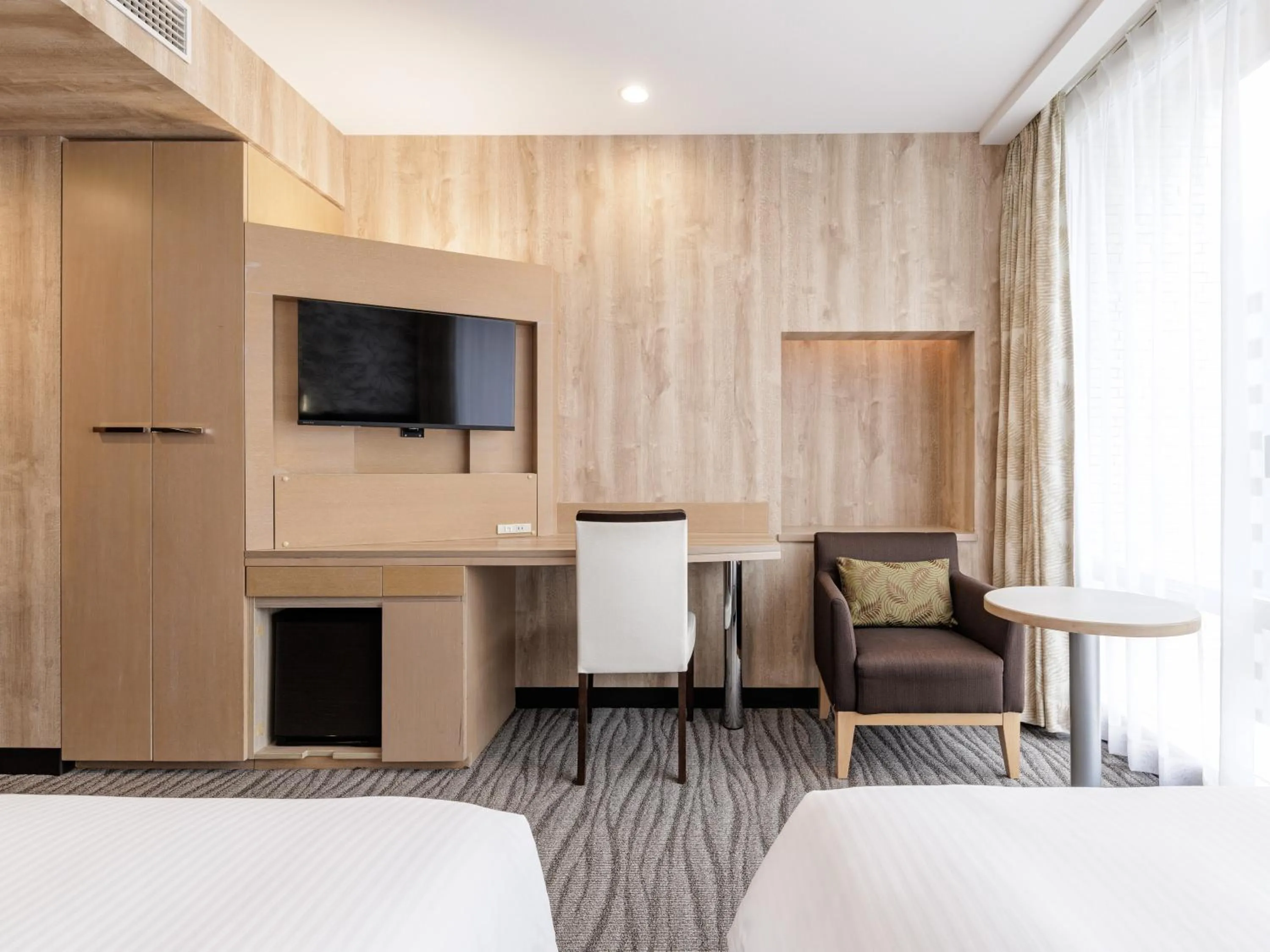 Bedroom, Bed in Nishitetsu Resort Inn Naha