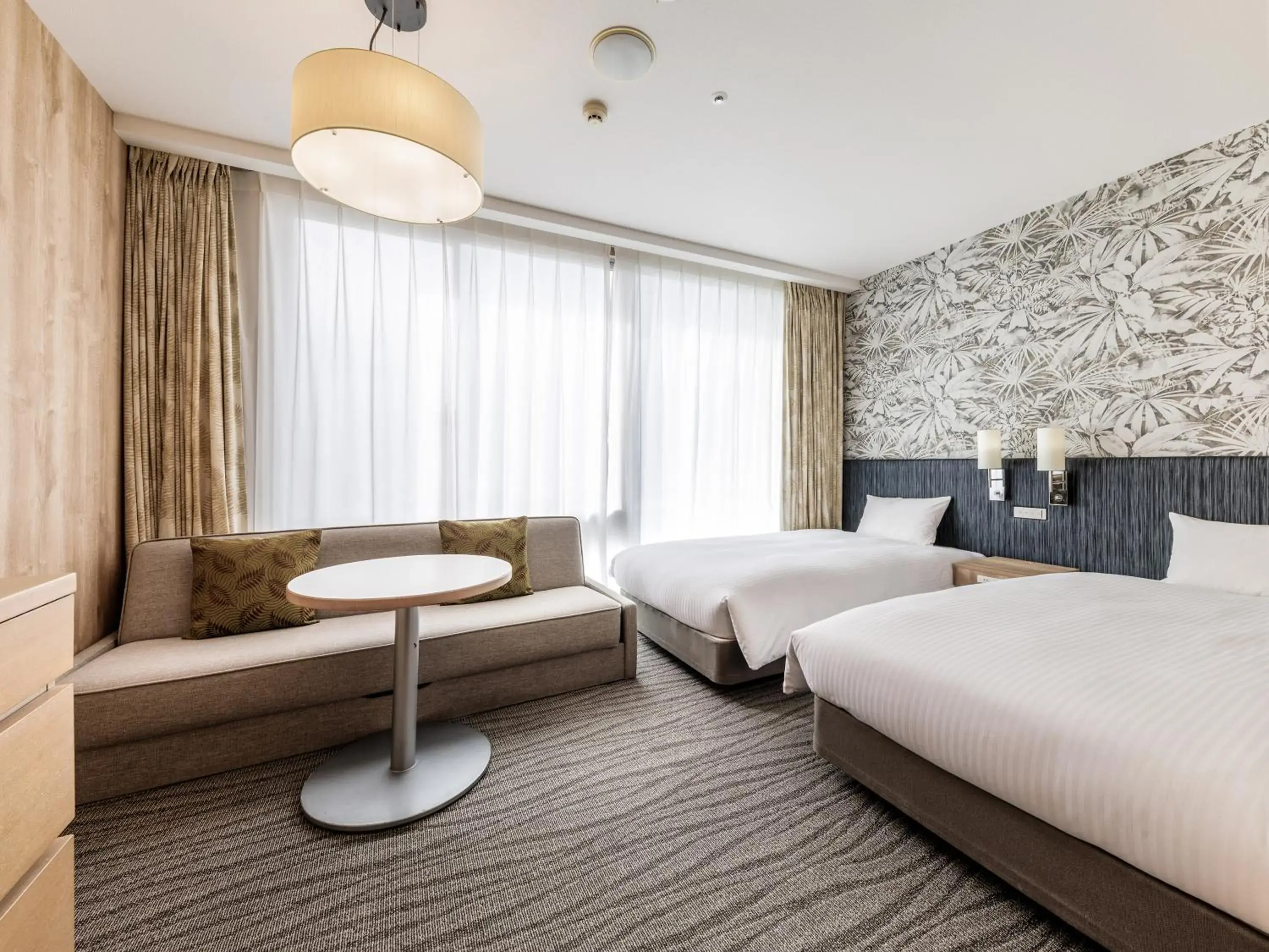 Photo of the whole room, Bed in Nishitetsu Resort Inn Naha Photo of the whole room, Bed in Nishitetsu Resort Inn Naha