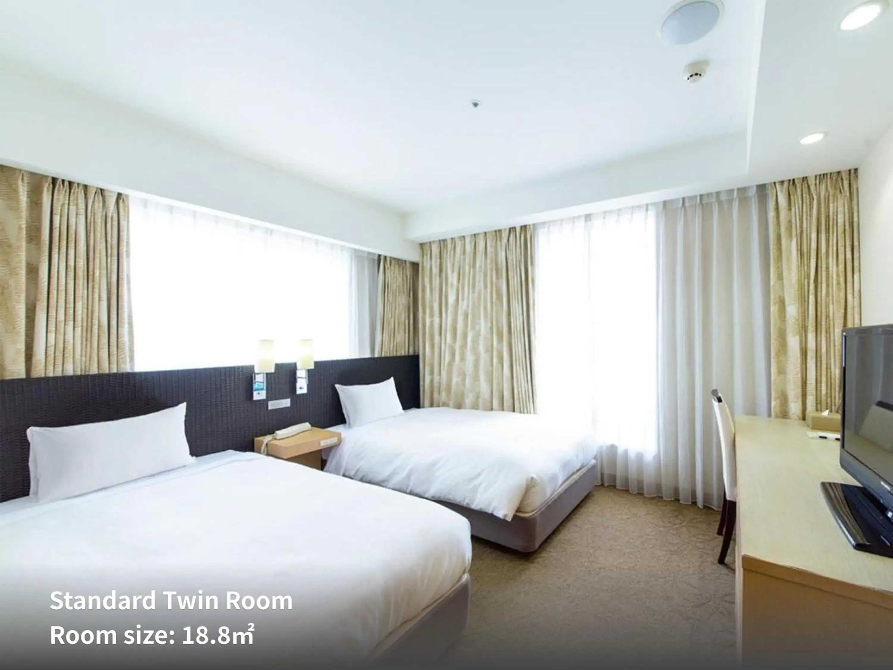 Photo of the whole room, Bed in Nishitetsu Resort Inn Naha Photo of the whole room, Bed in Nishitetsu Resort Inn Naha