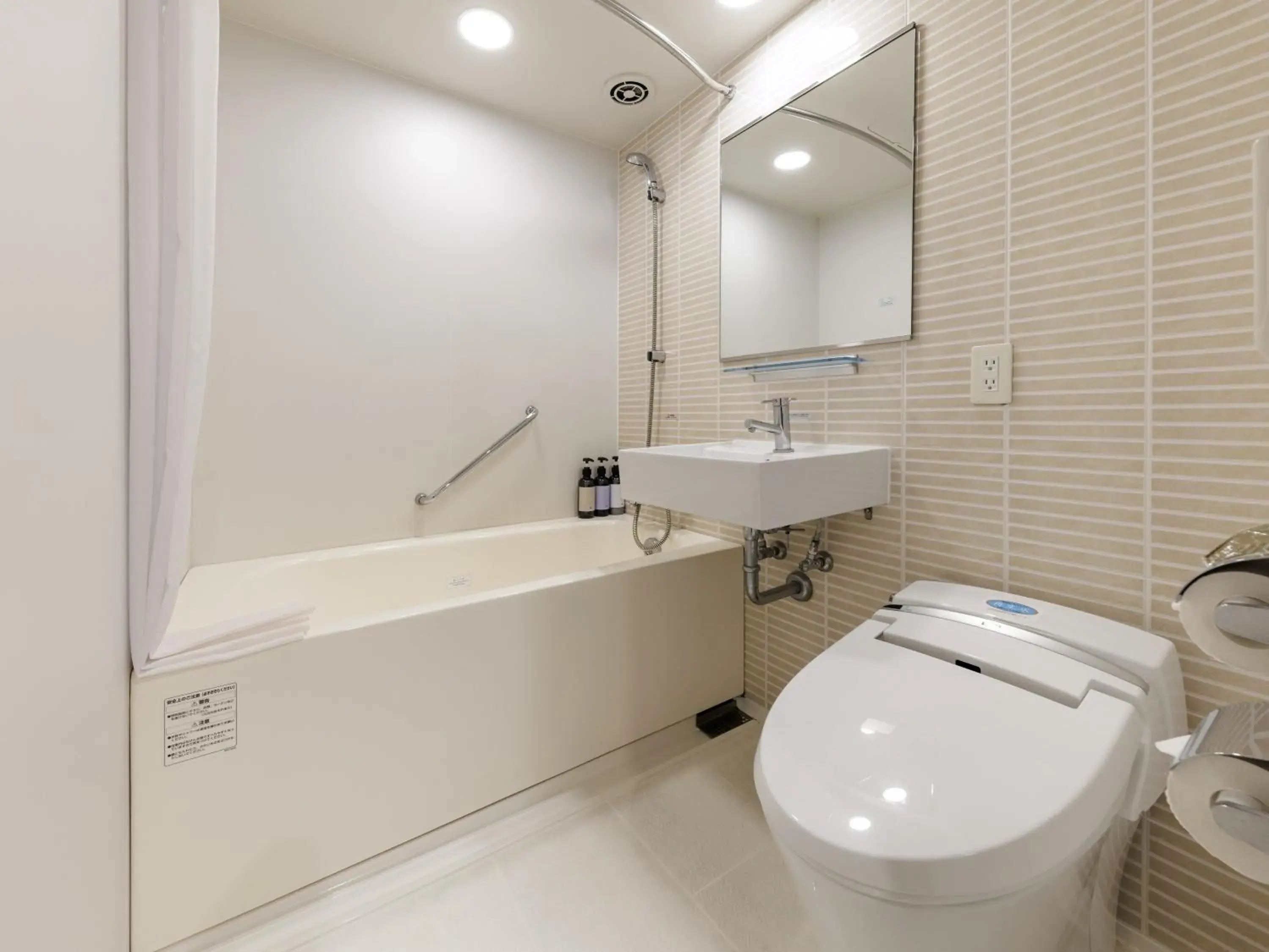 Bathroom in Nishitetsu Resort Inn Naha Bathroom in Nishitetsu Resort Inn Naha