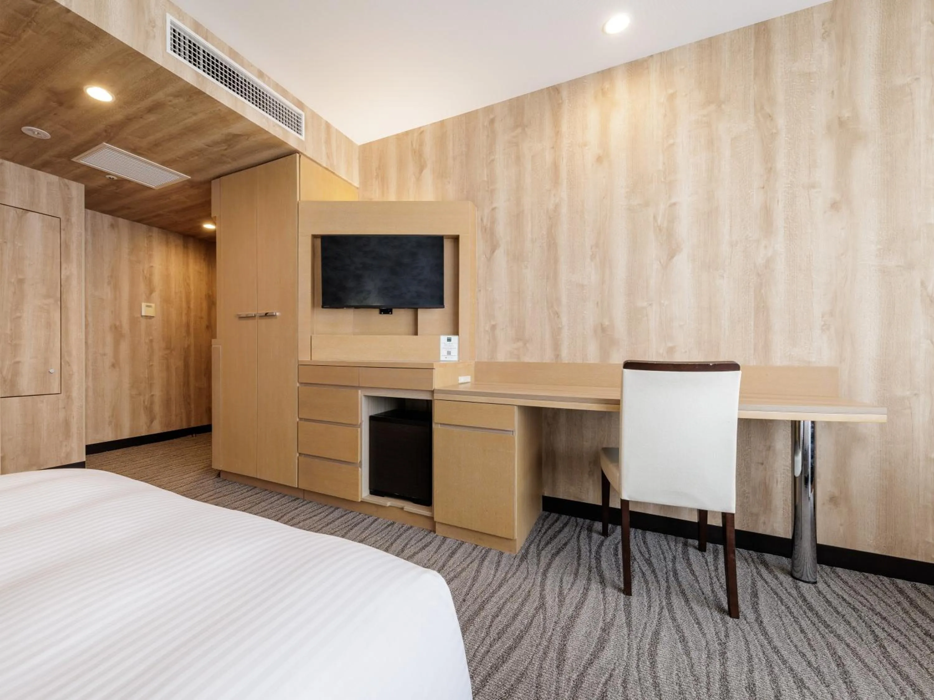 Bedroom, Bed in Nishitetsu Resort Inn Naha