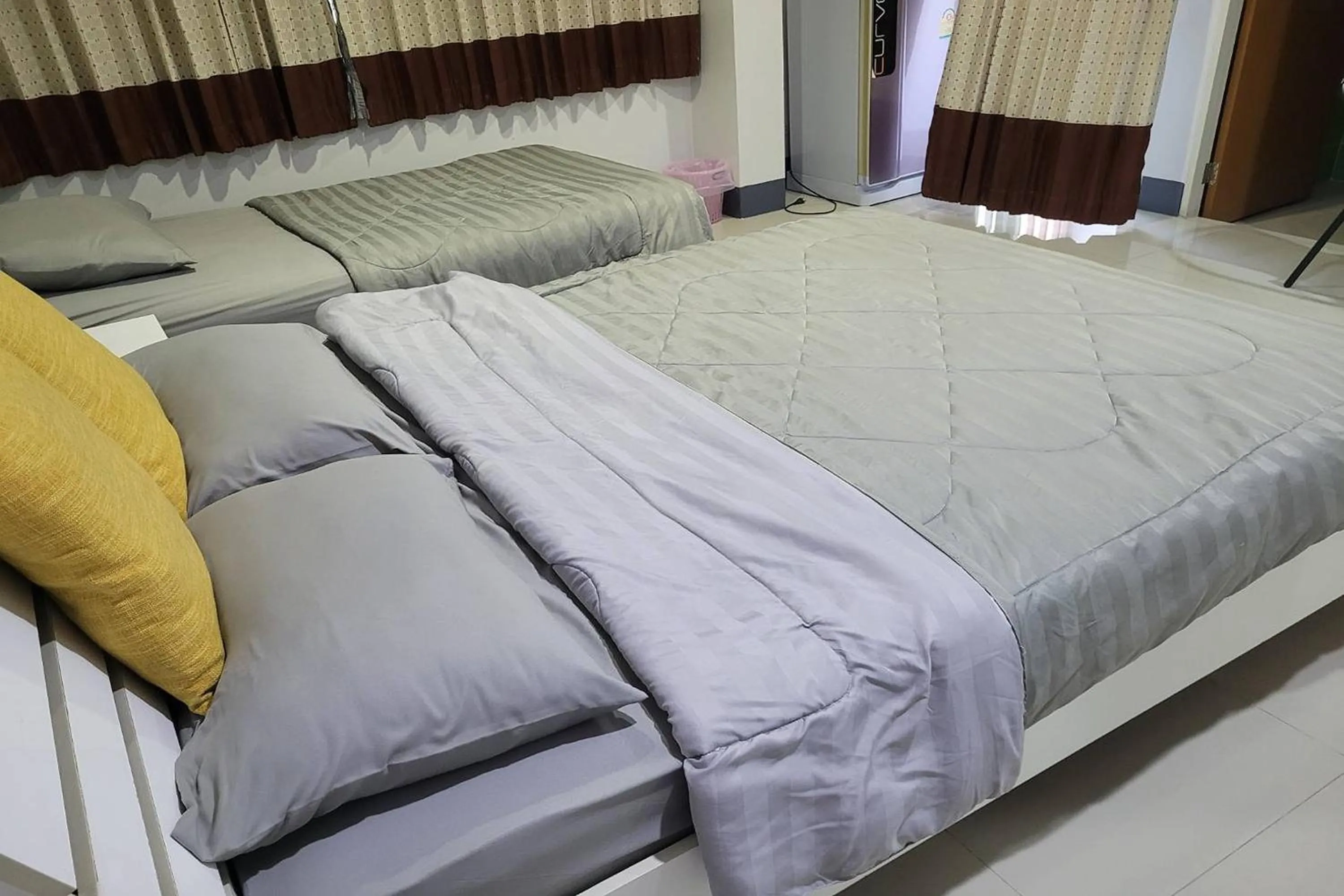 Bed in Kaewchantra Mansion