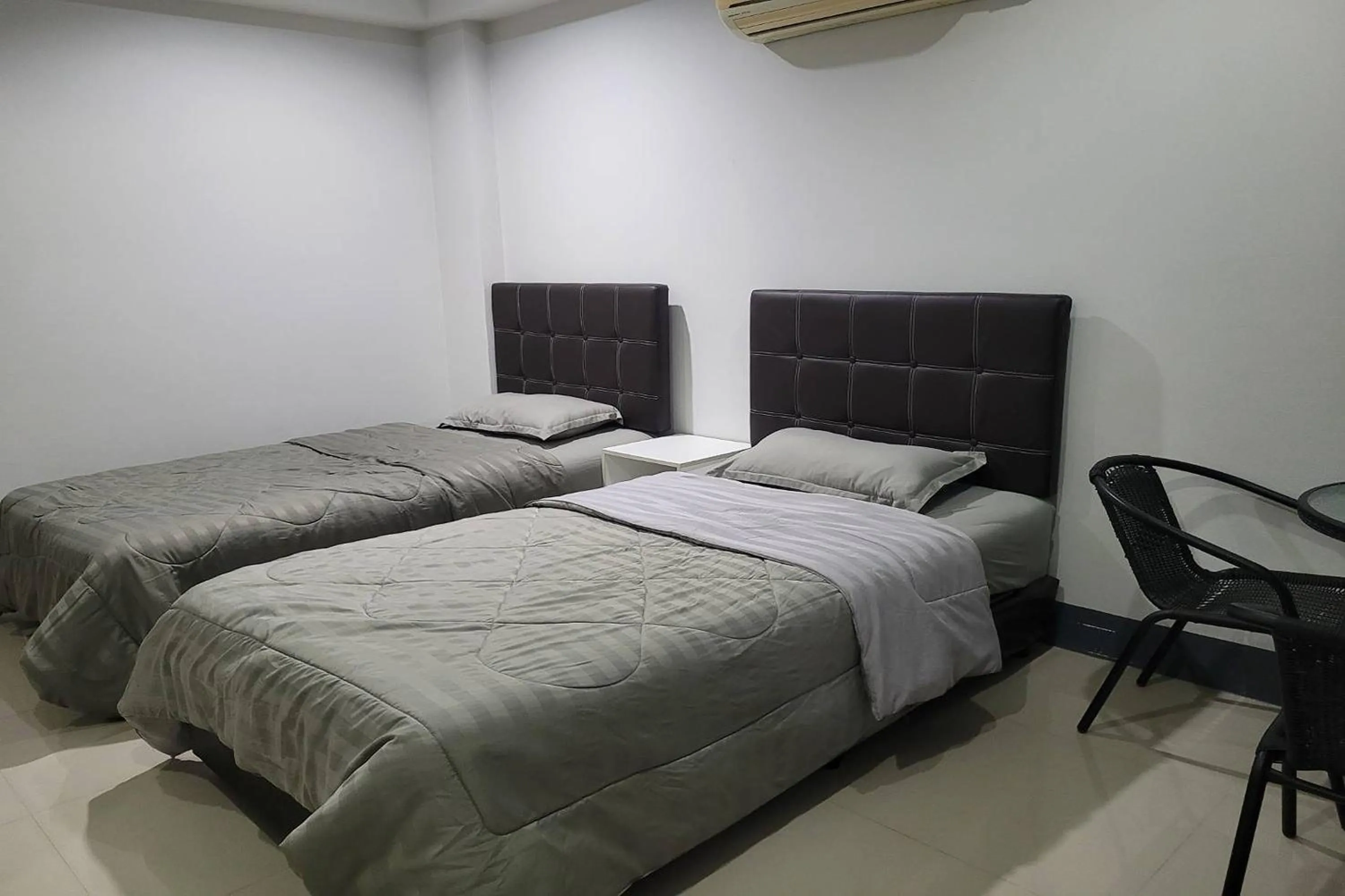 Bed in Kaewchantra Mansion