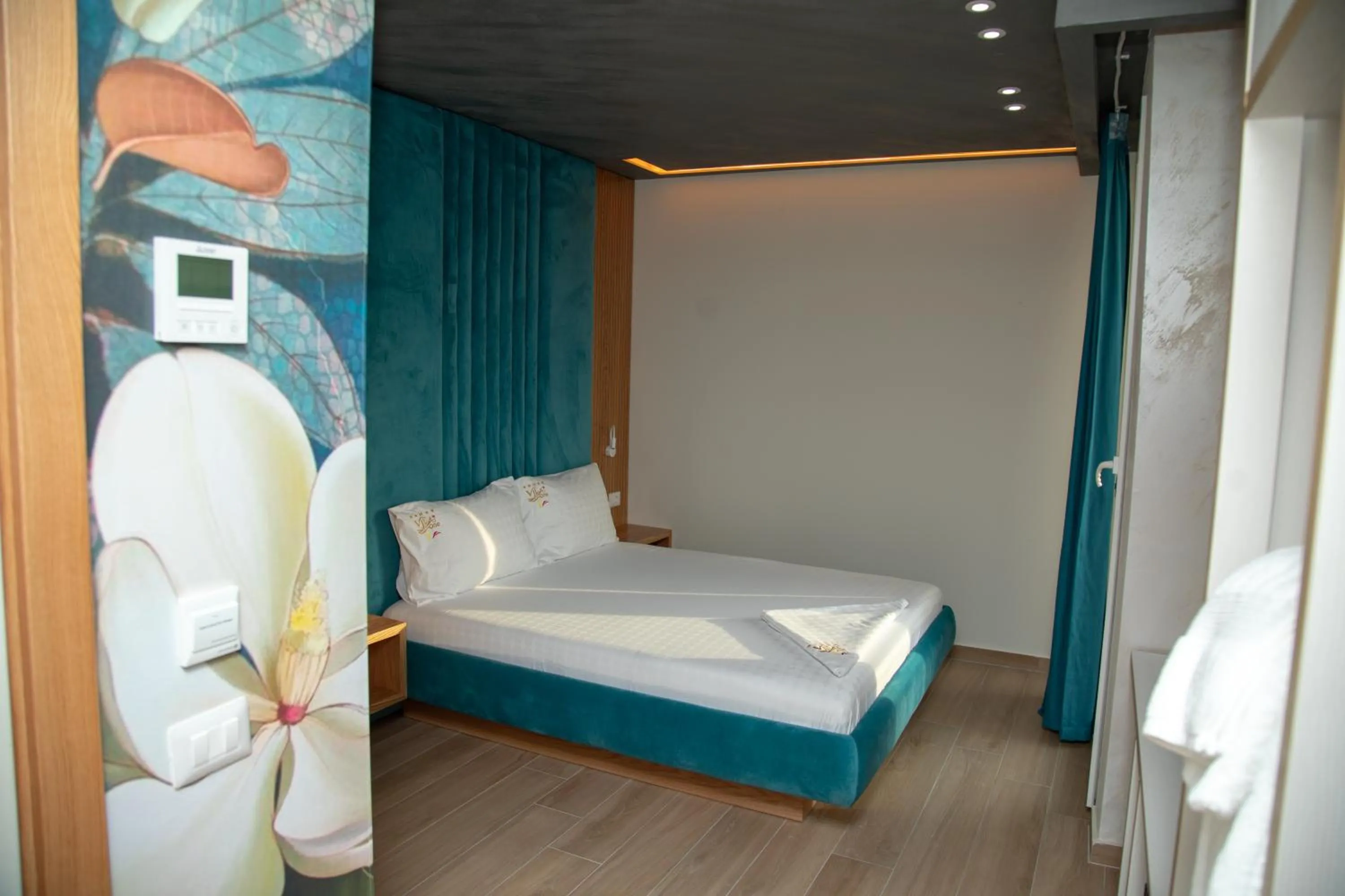 Photo of the whole room, Bed in Vila One Beach Hotel