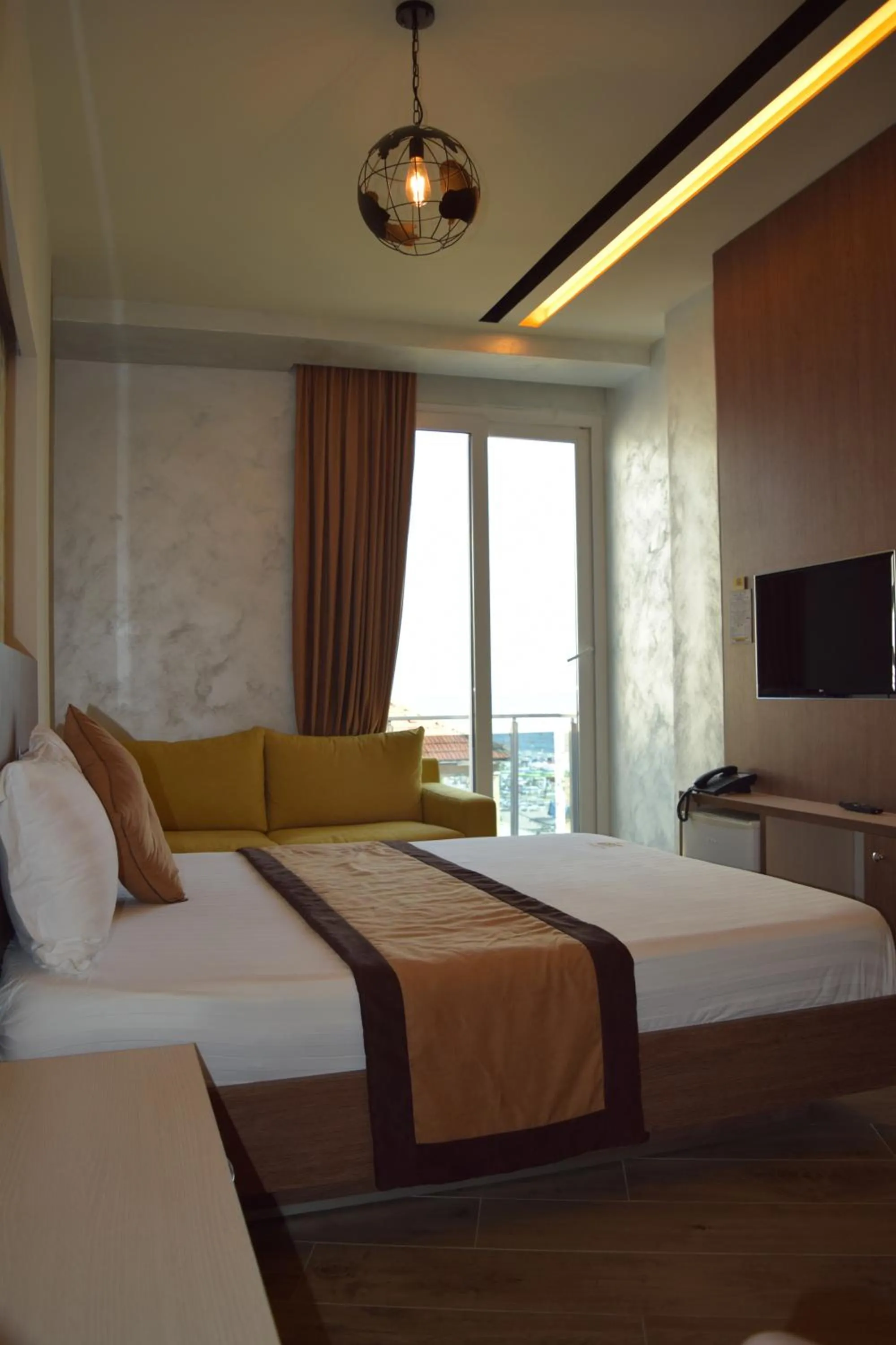 Bed in Vila One Beach Hotel
