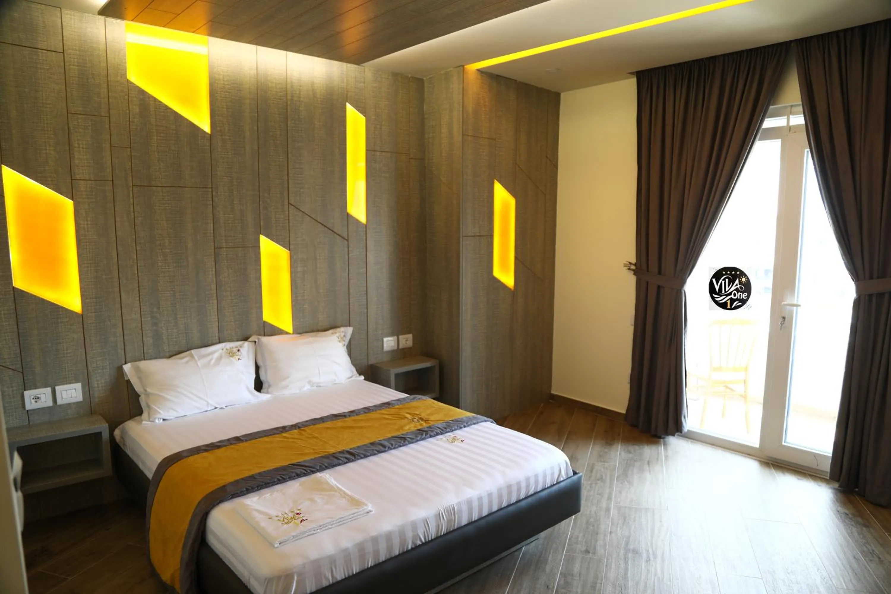 Bed in Vila One Beach Hotel