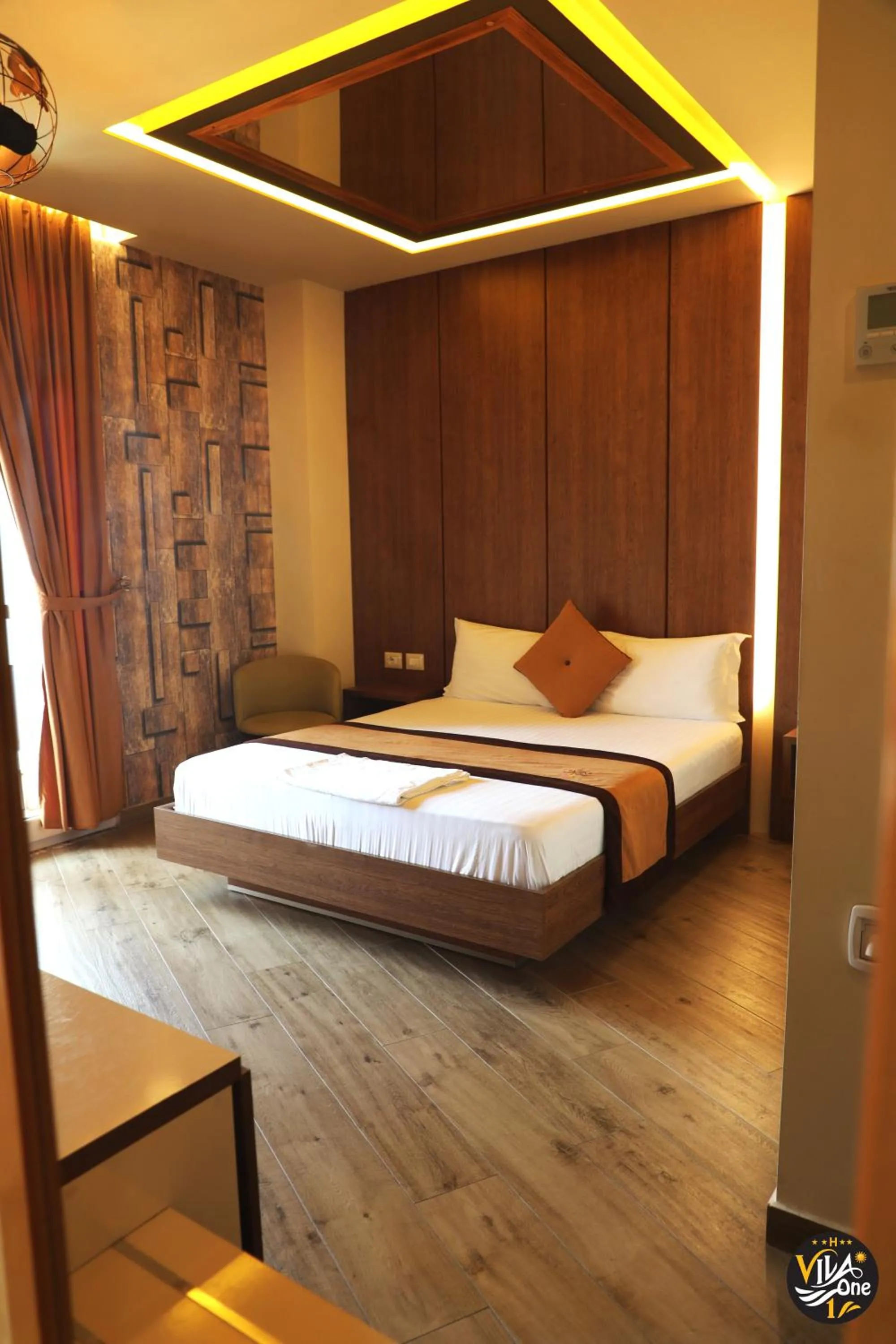 Photo of the whole room, Bed in Vila One Beach Hotel