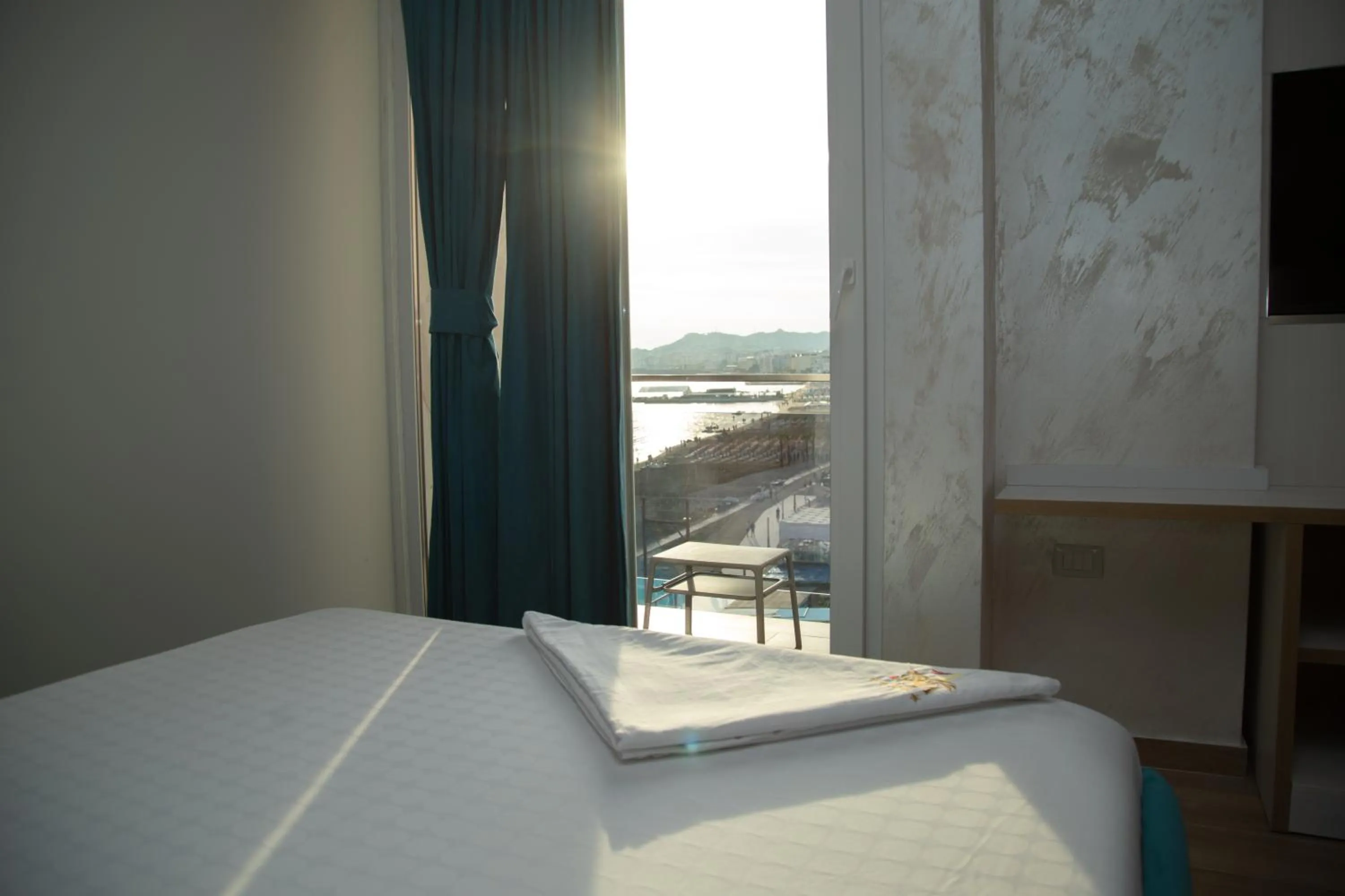 Bed in Vila One Beach Hotel