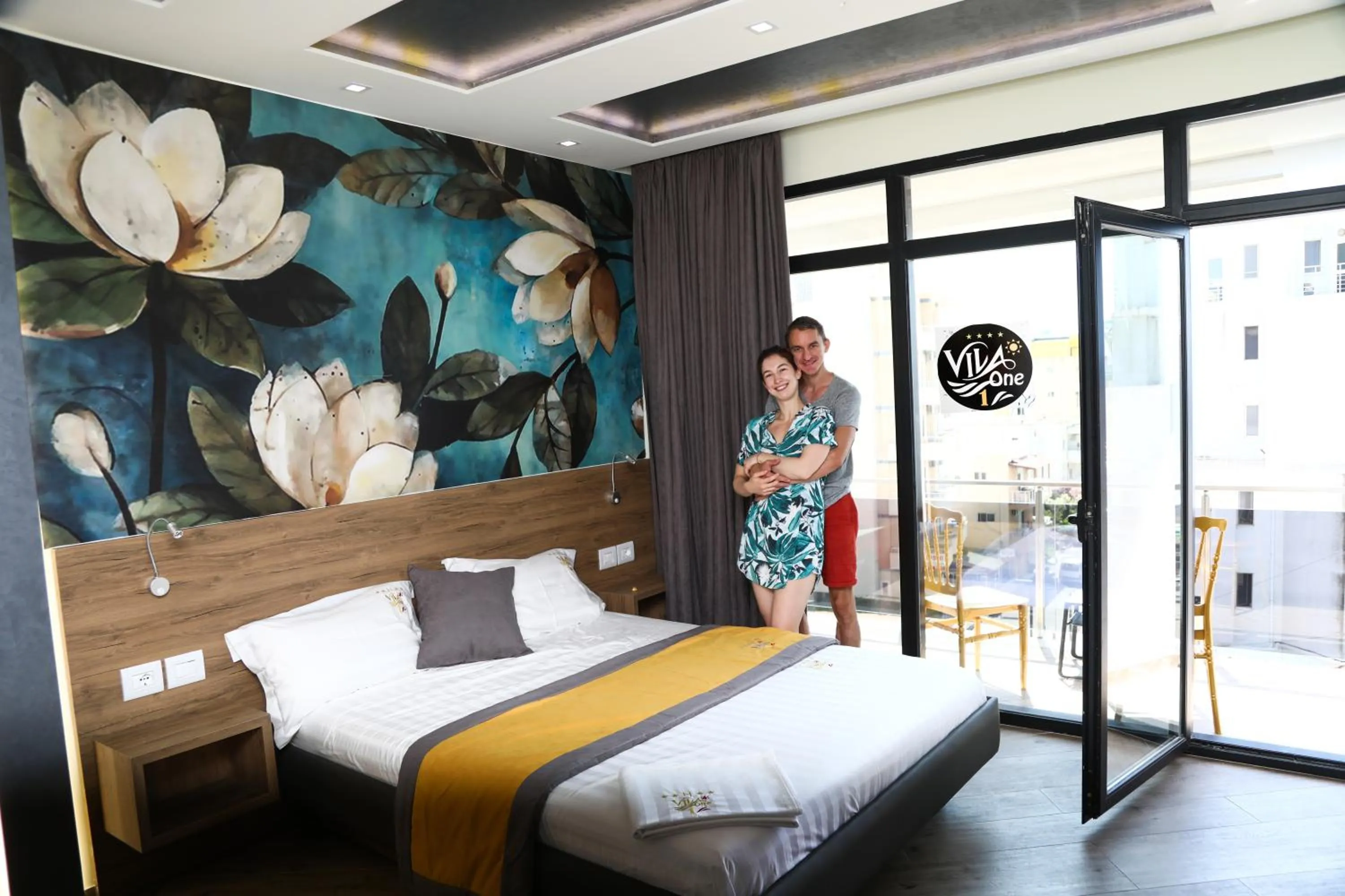group of guests, Bed in Vila One Beach Hotel