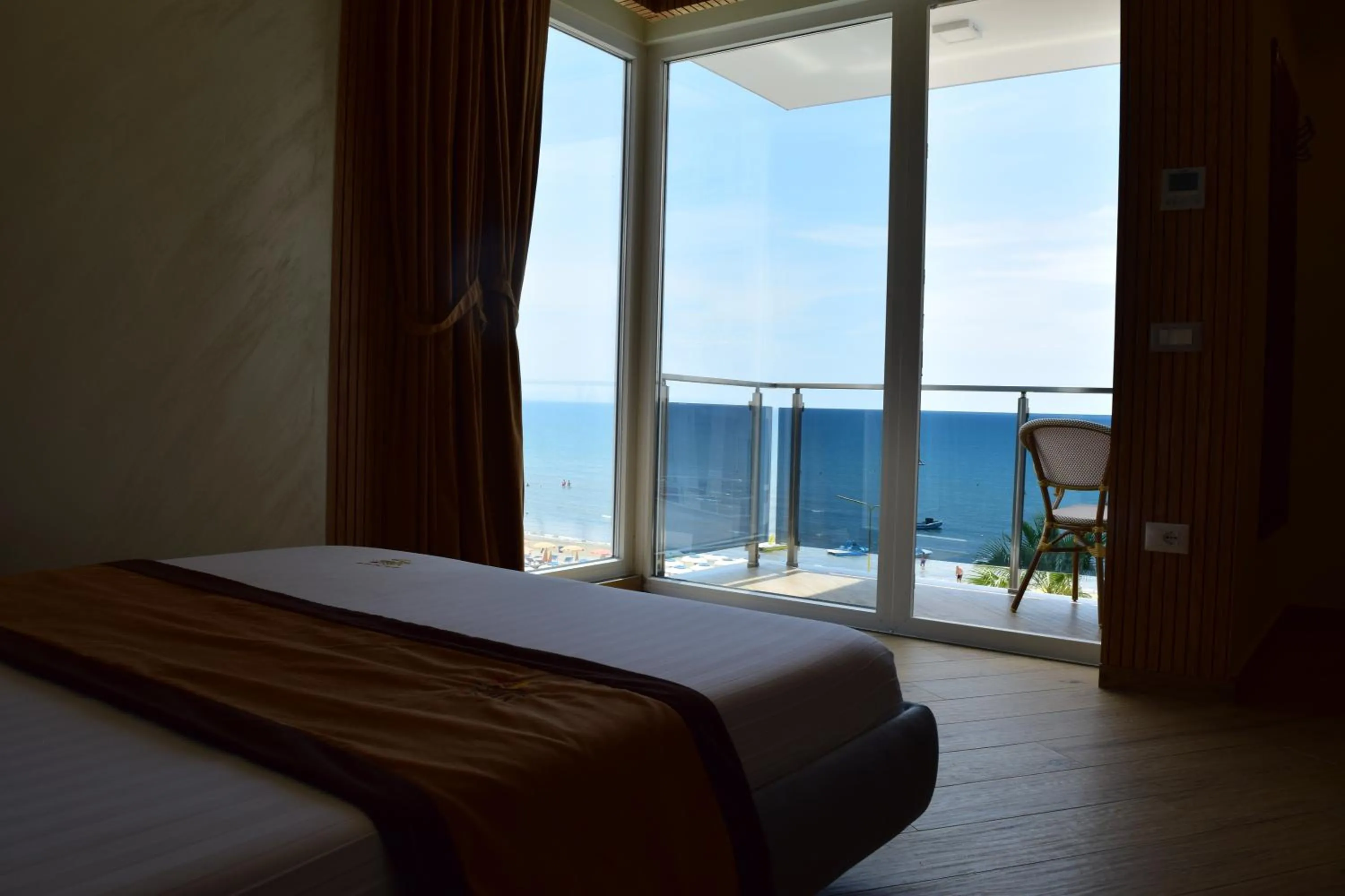 Bed in Vila One Beach Hotel