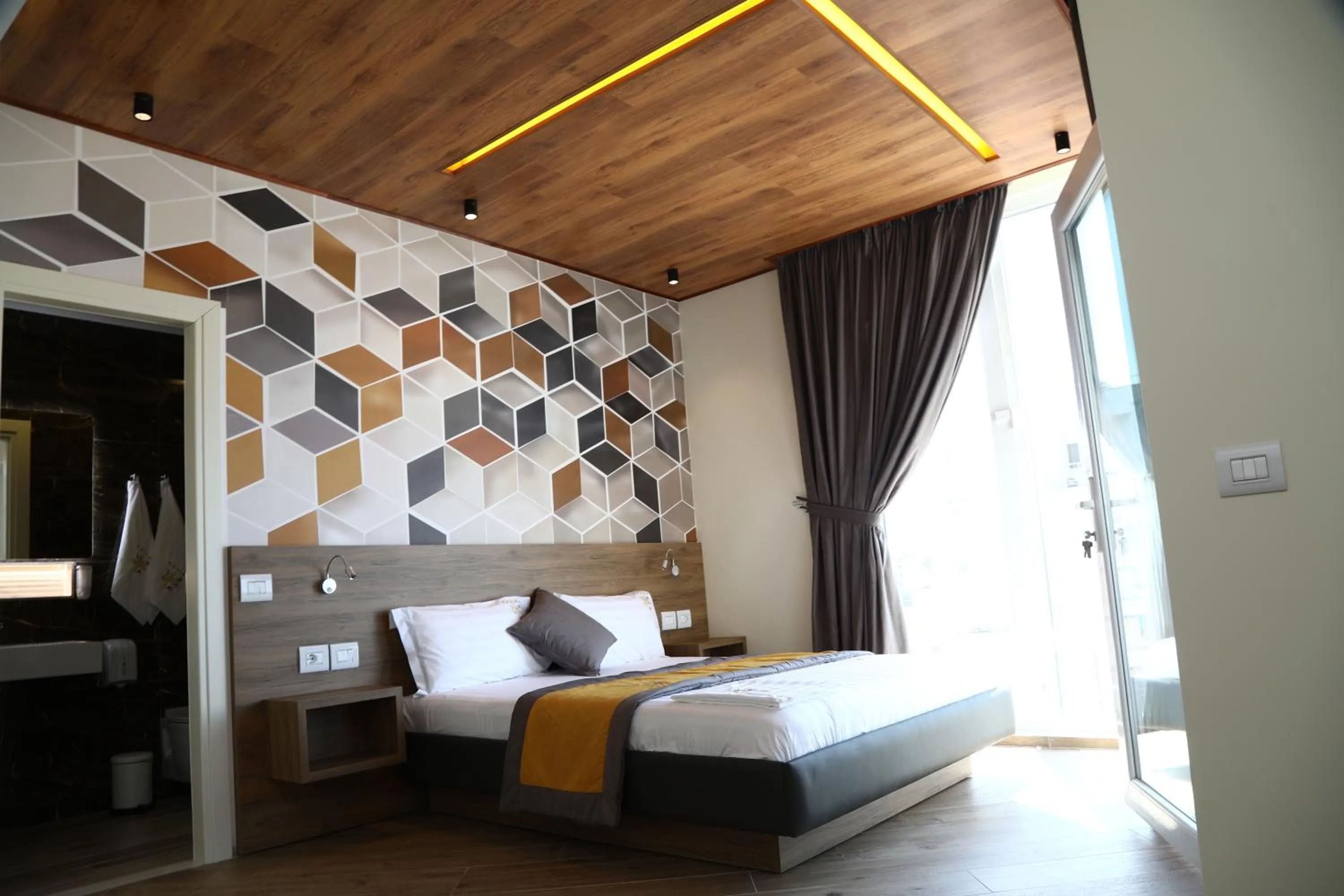Bed in Vila One Beach Hotel
