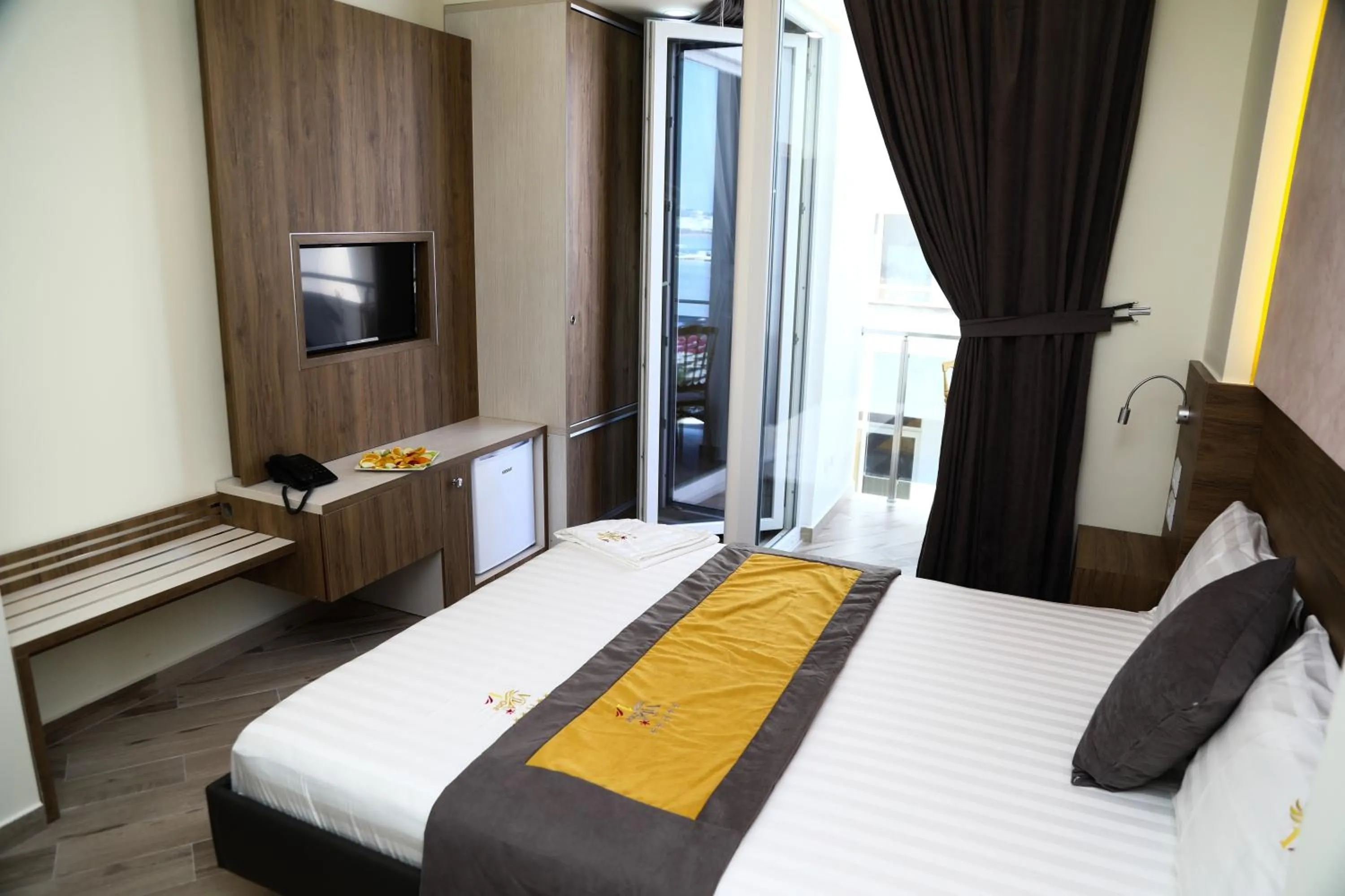 Bed in Vila One Beach Hotel