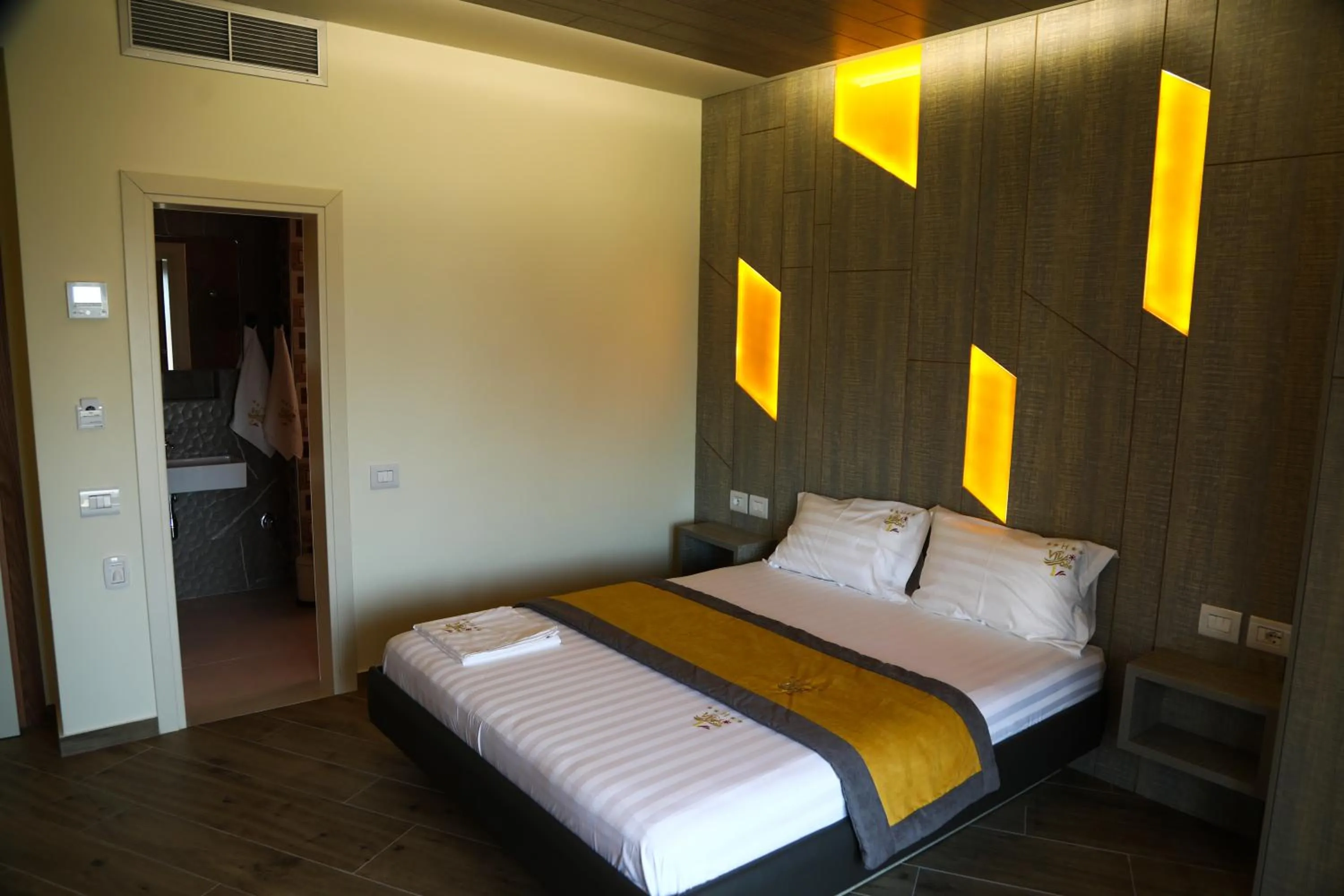 Photo of the whole room, Bed in Vila One Beach Hotel