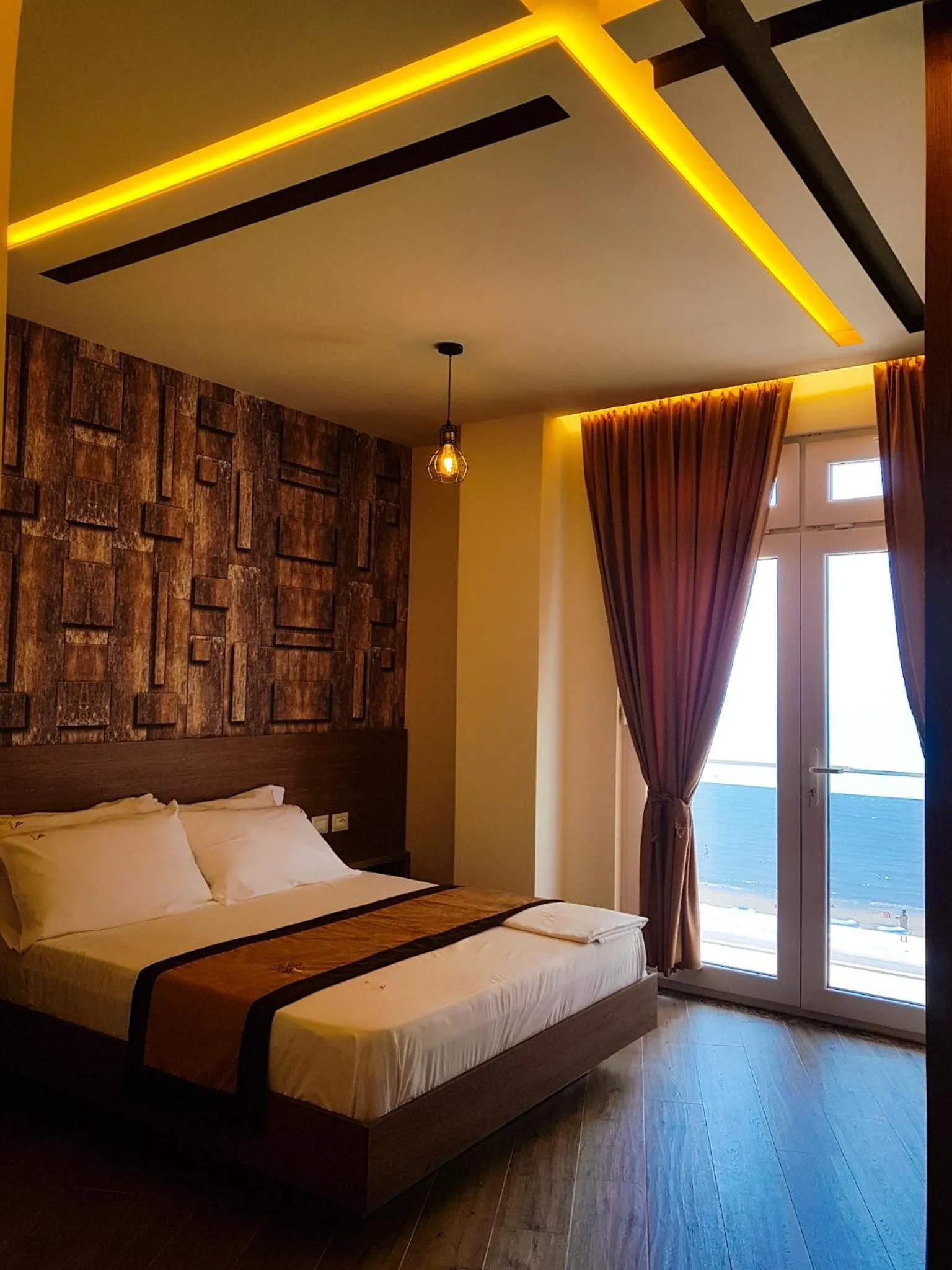 Bed in Vila One Beach Hotel