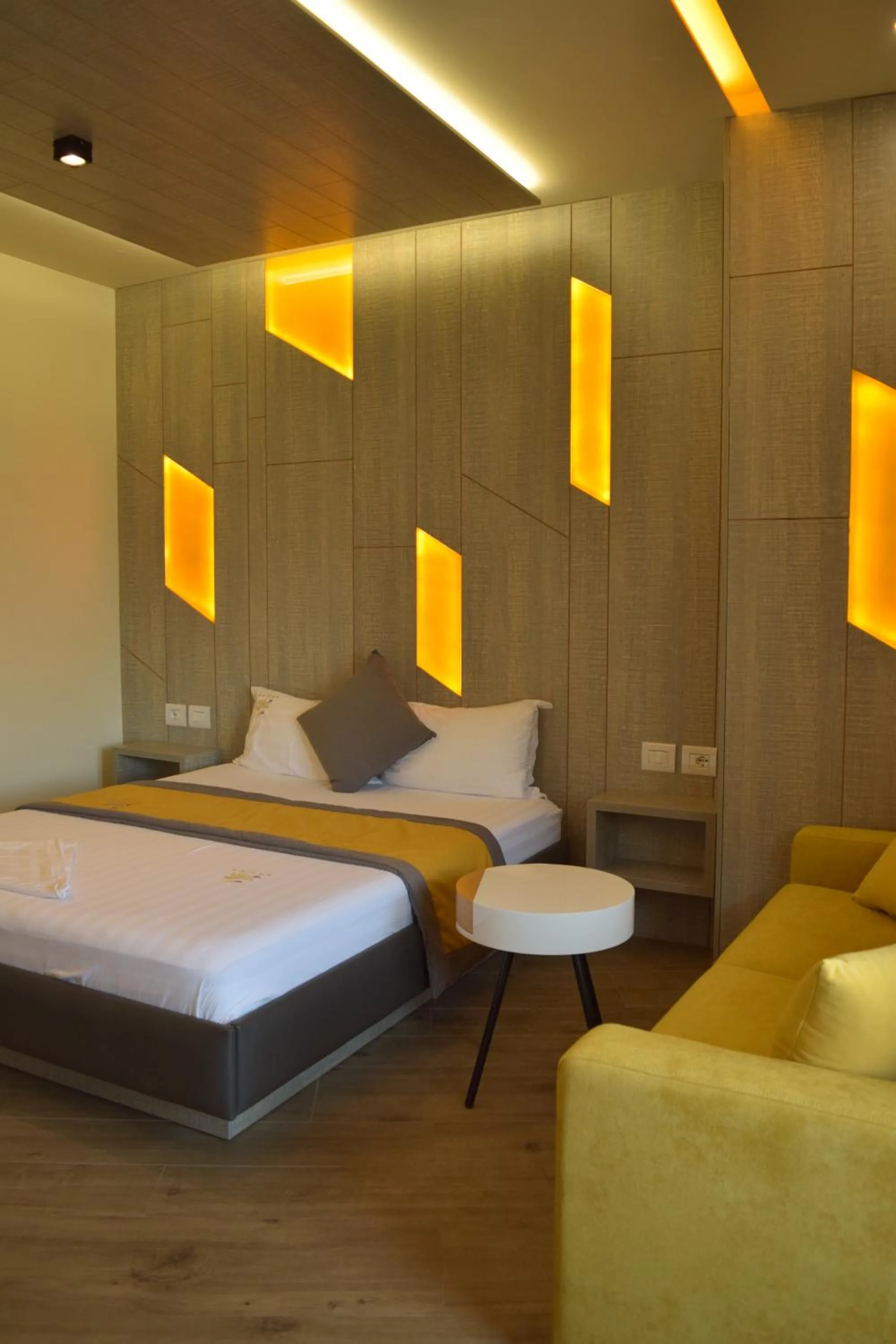Bed in Vila One Beach Hotel