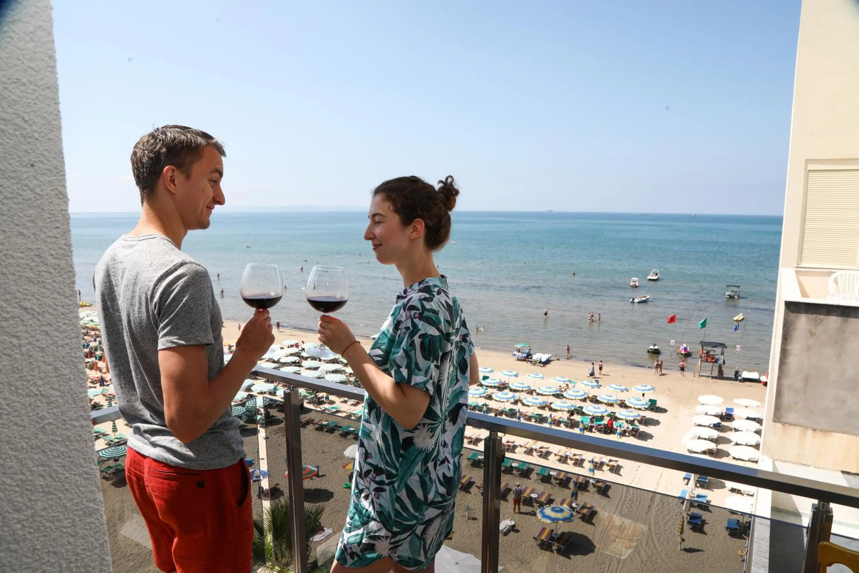 People in Vila One Beach Hotel