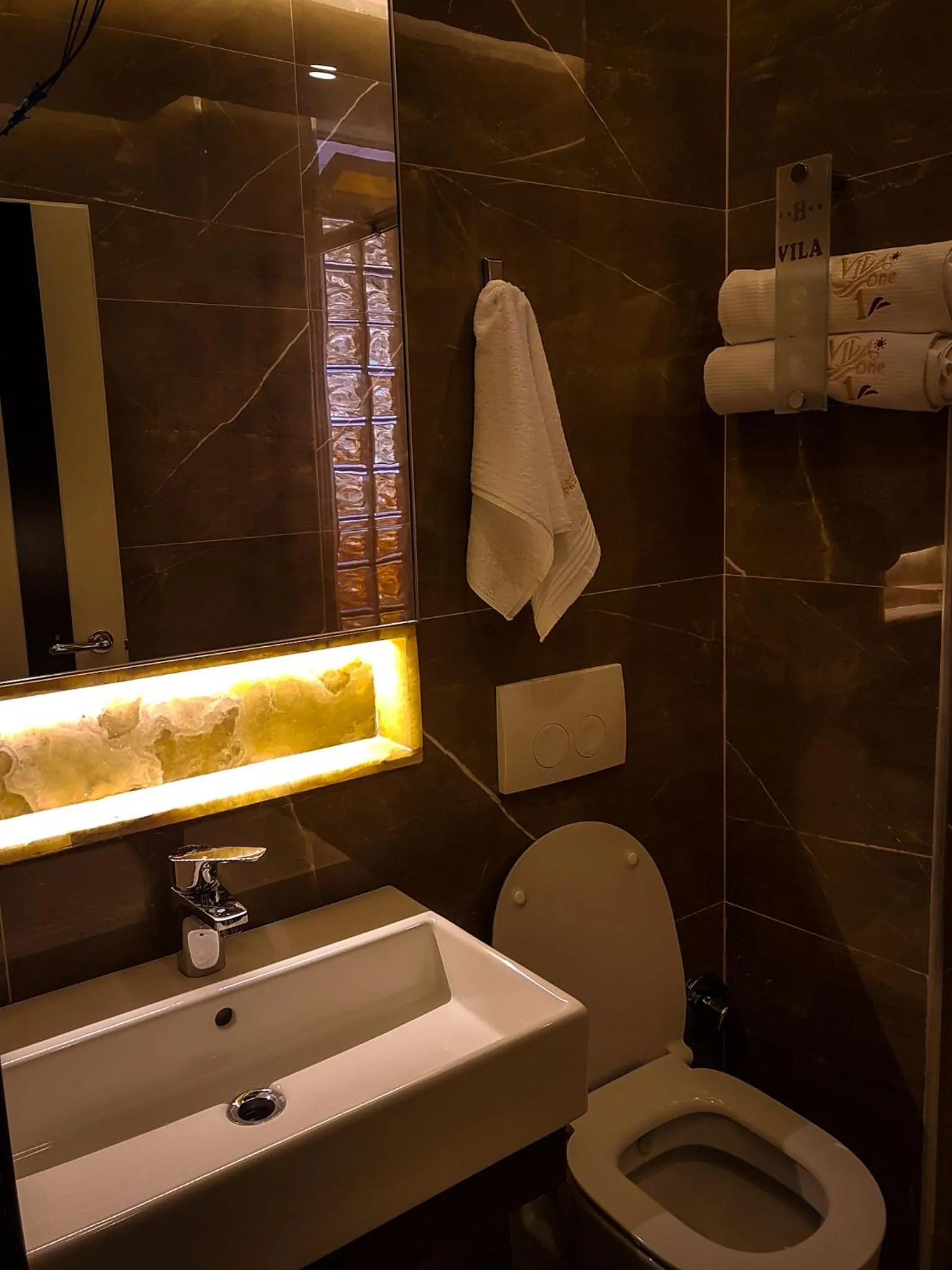 Toilet in Vila One Beach Hotel