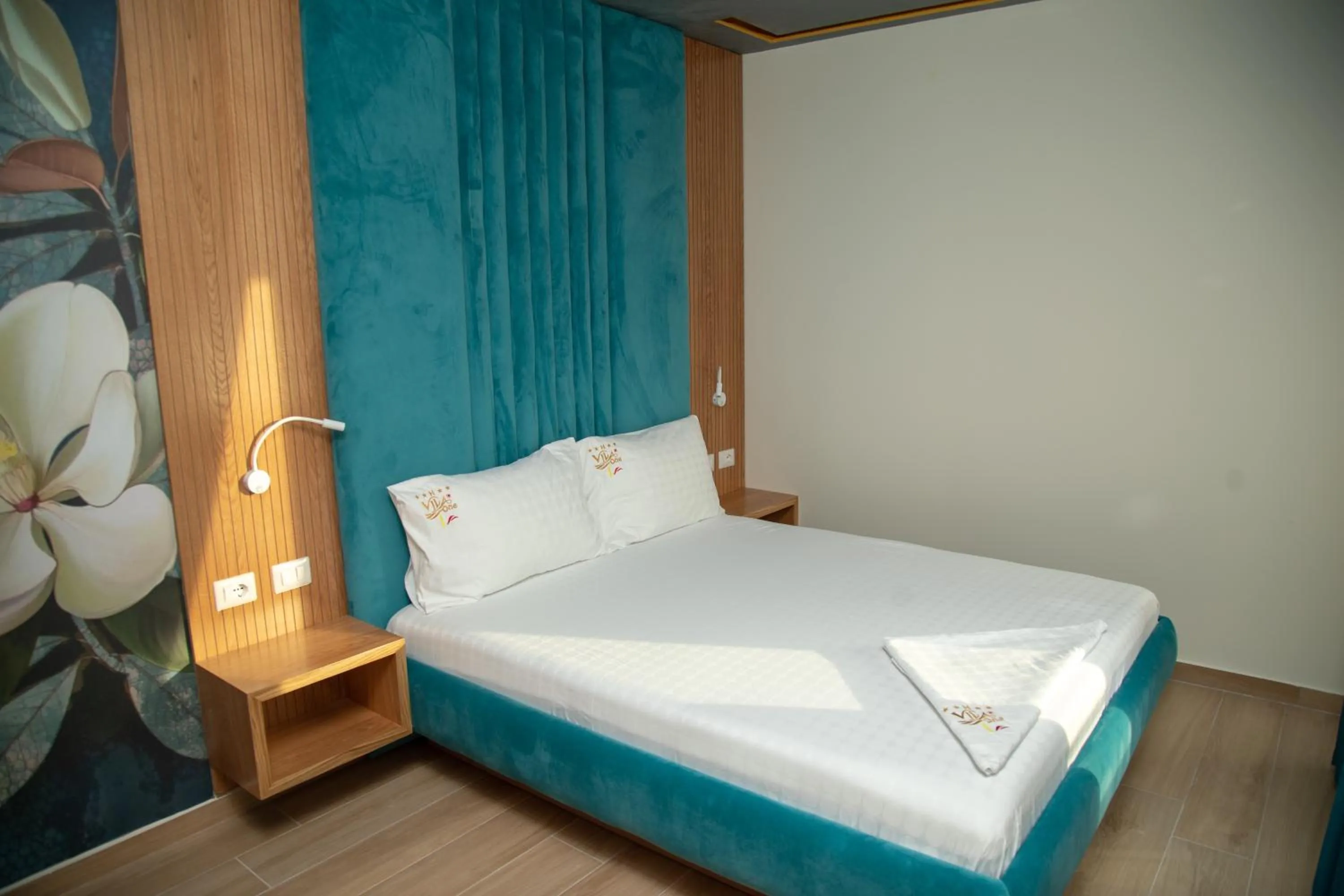 Photo of the whole room, Bed in Vila One Beach Hotel