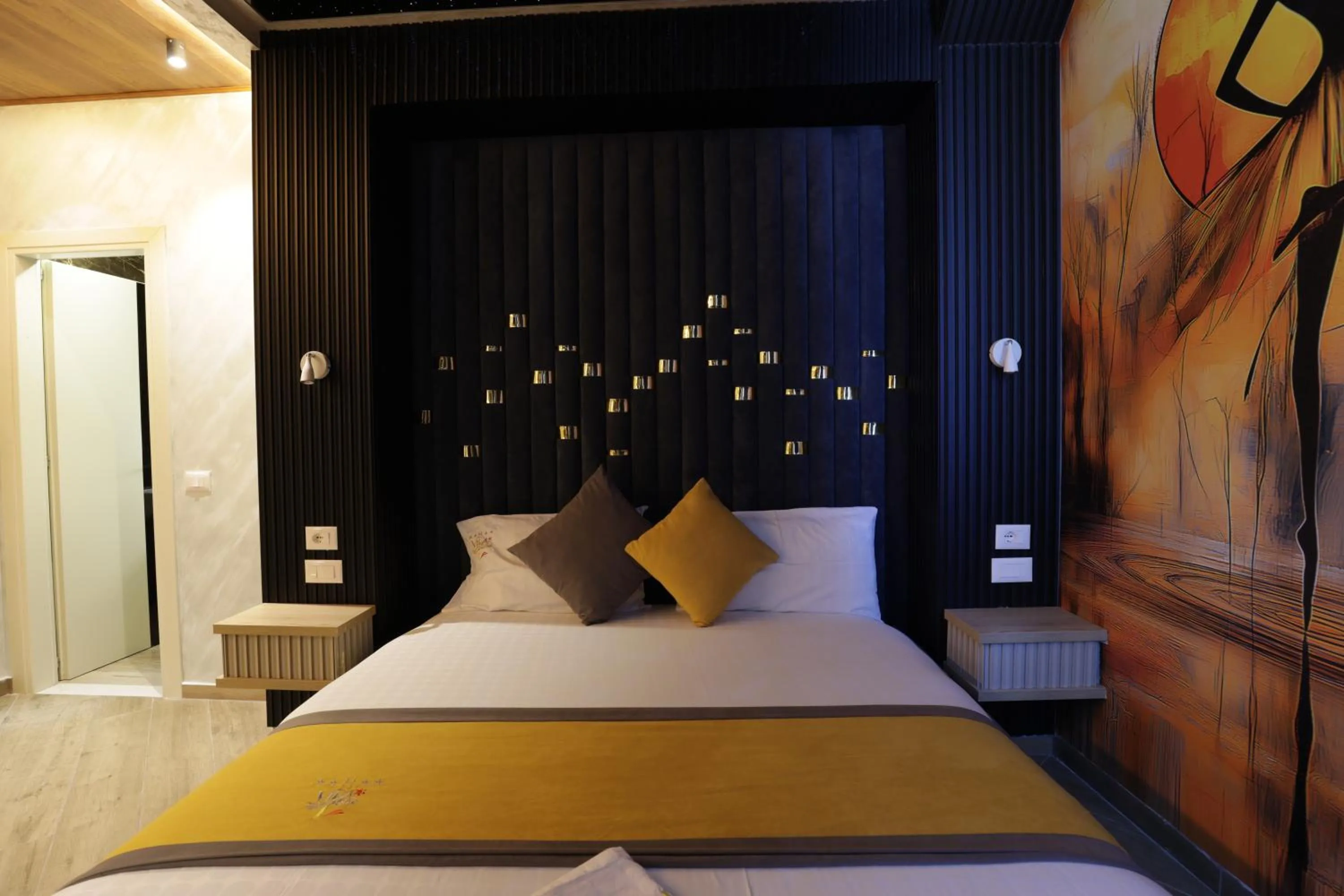 Bed in Vila One Beach Hotel