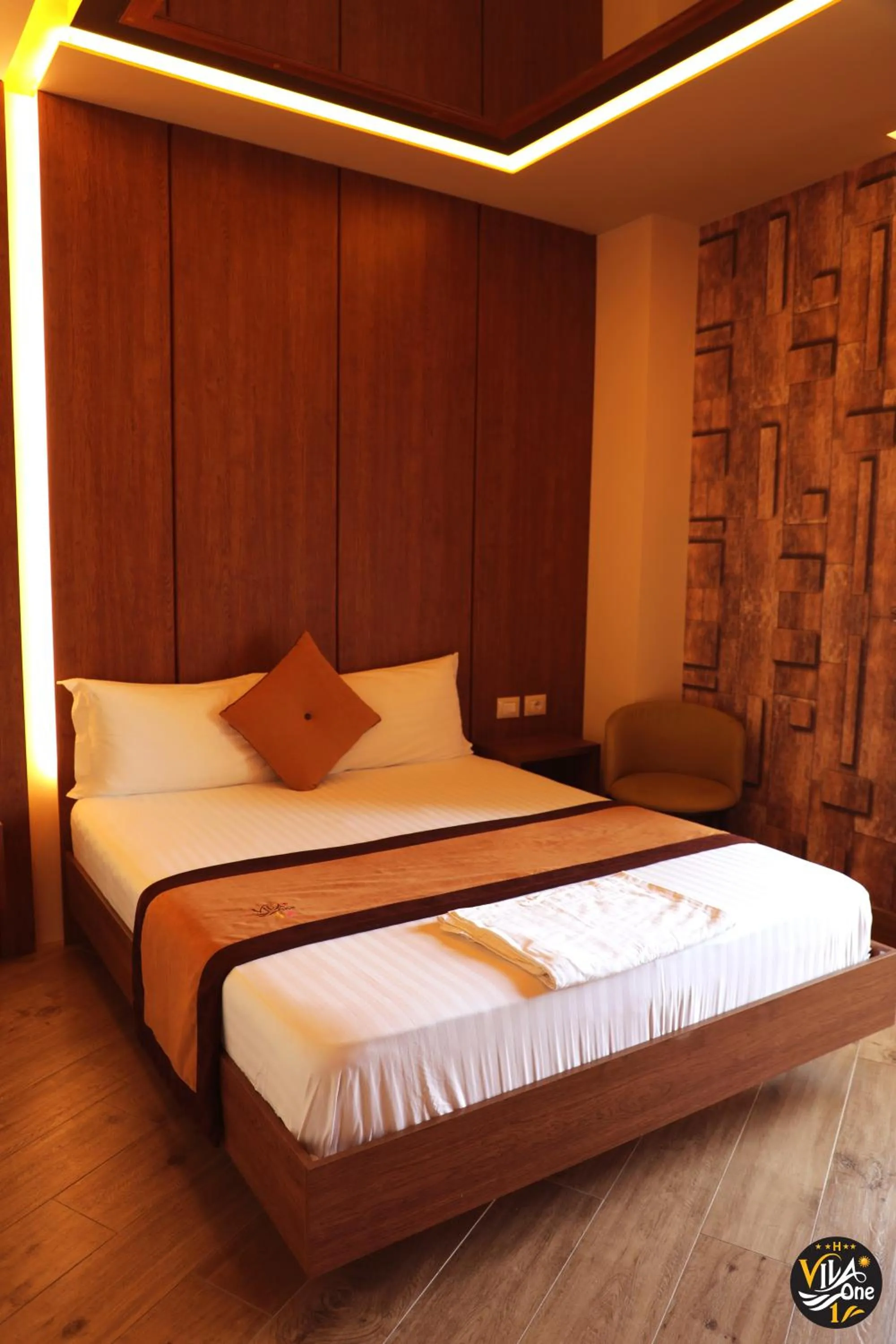 Bed in Vila One Beach Hotel