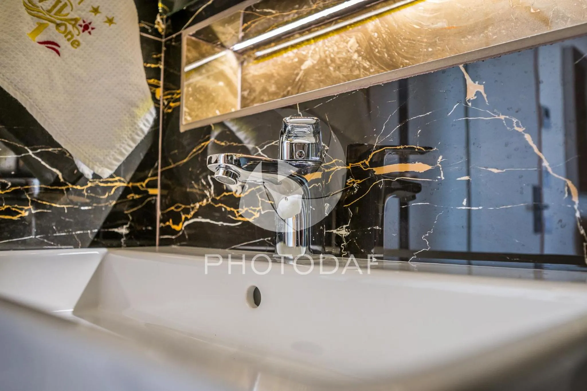 Toilet in Vila One Beach Hotel