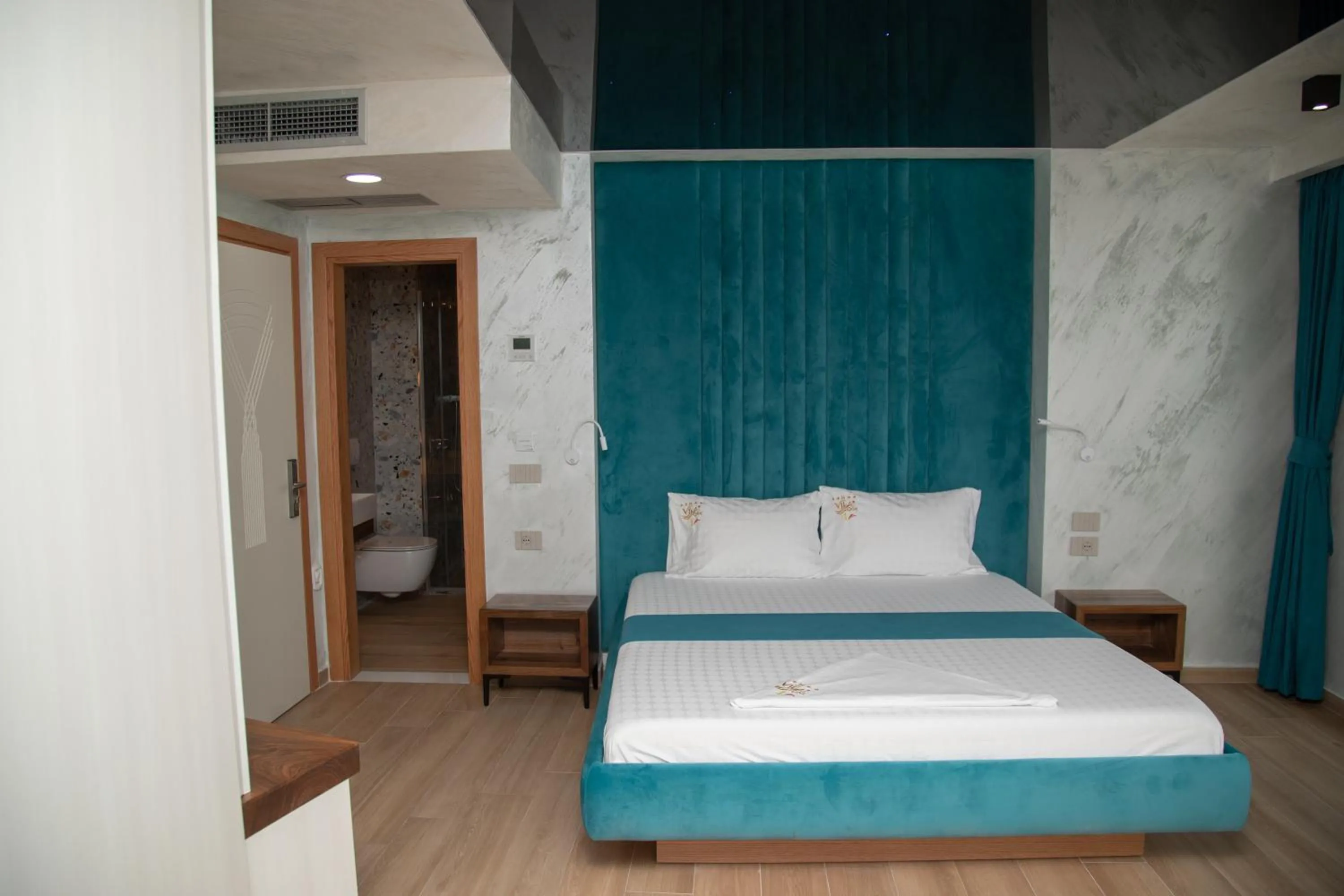 Bed in Vila One Beach Hotel