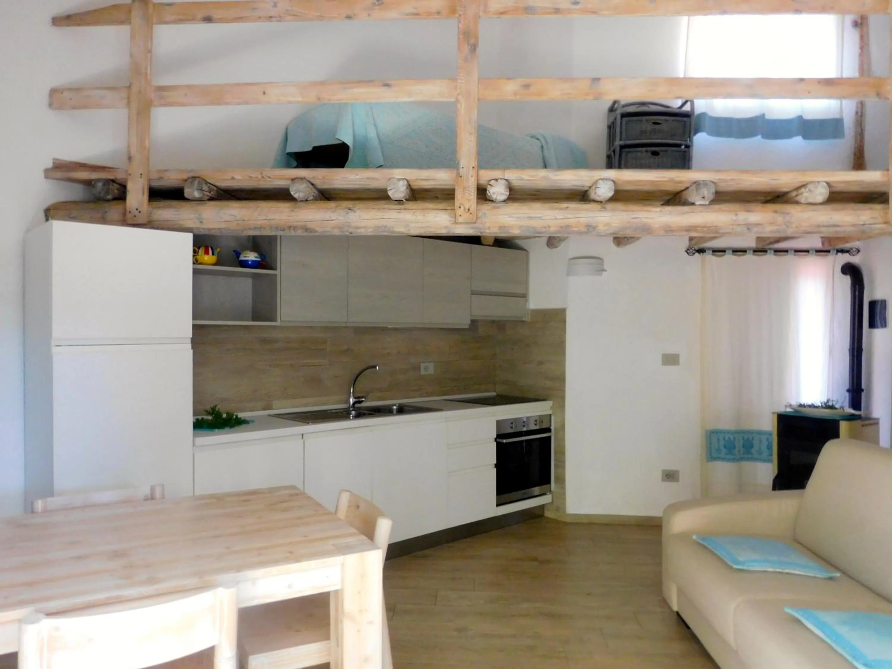 Kitchen or kitchenette in Residence La Pineta