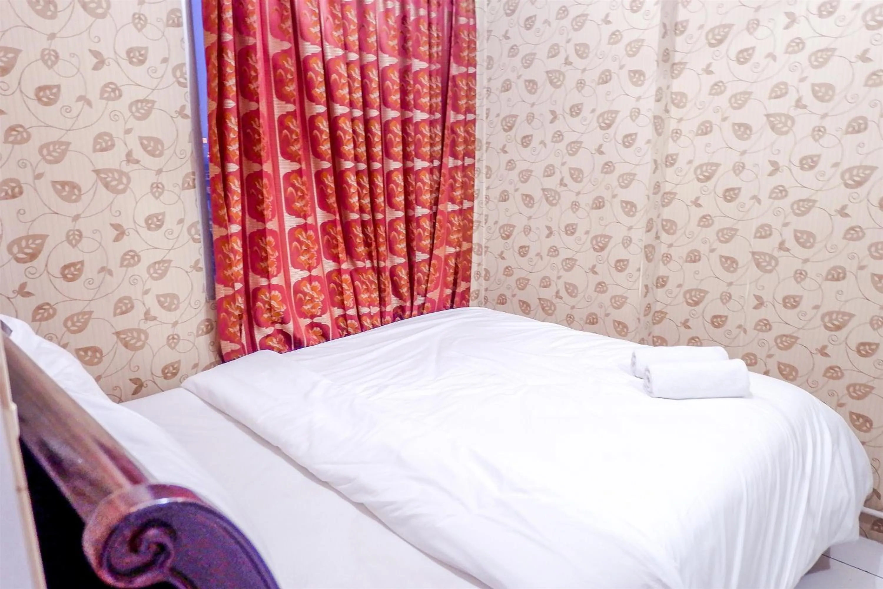 Bed in Strategic 2BR Menteng Square Apartment By Travelio