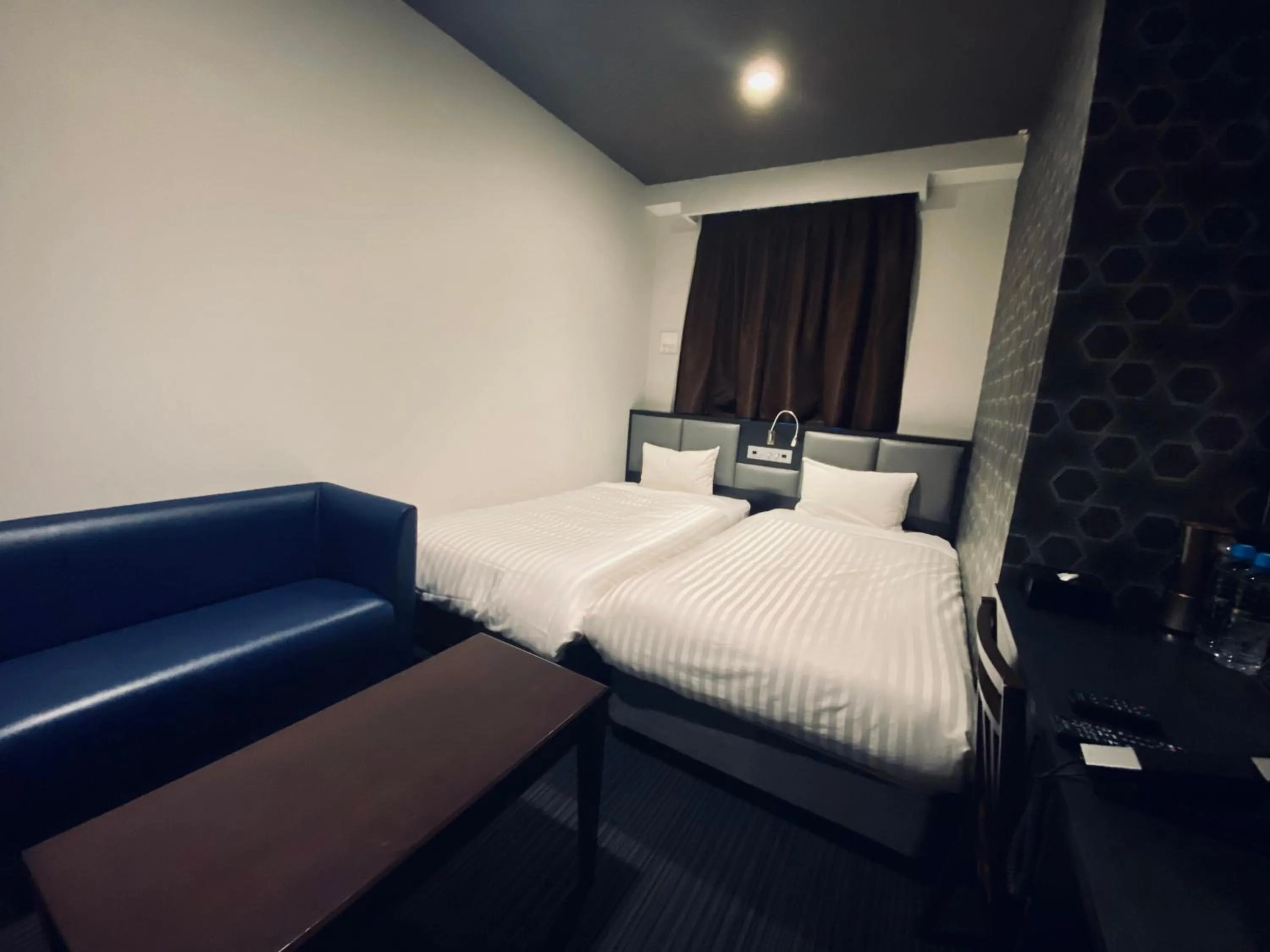 Photo of the whole room, Bed in Hotel Hulaton Fukuokahakata