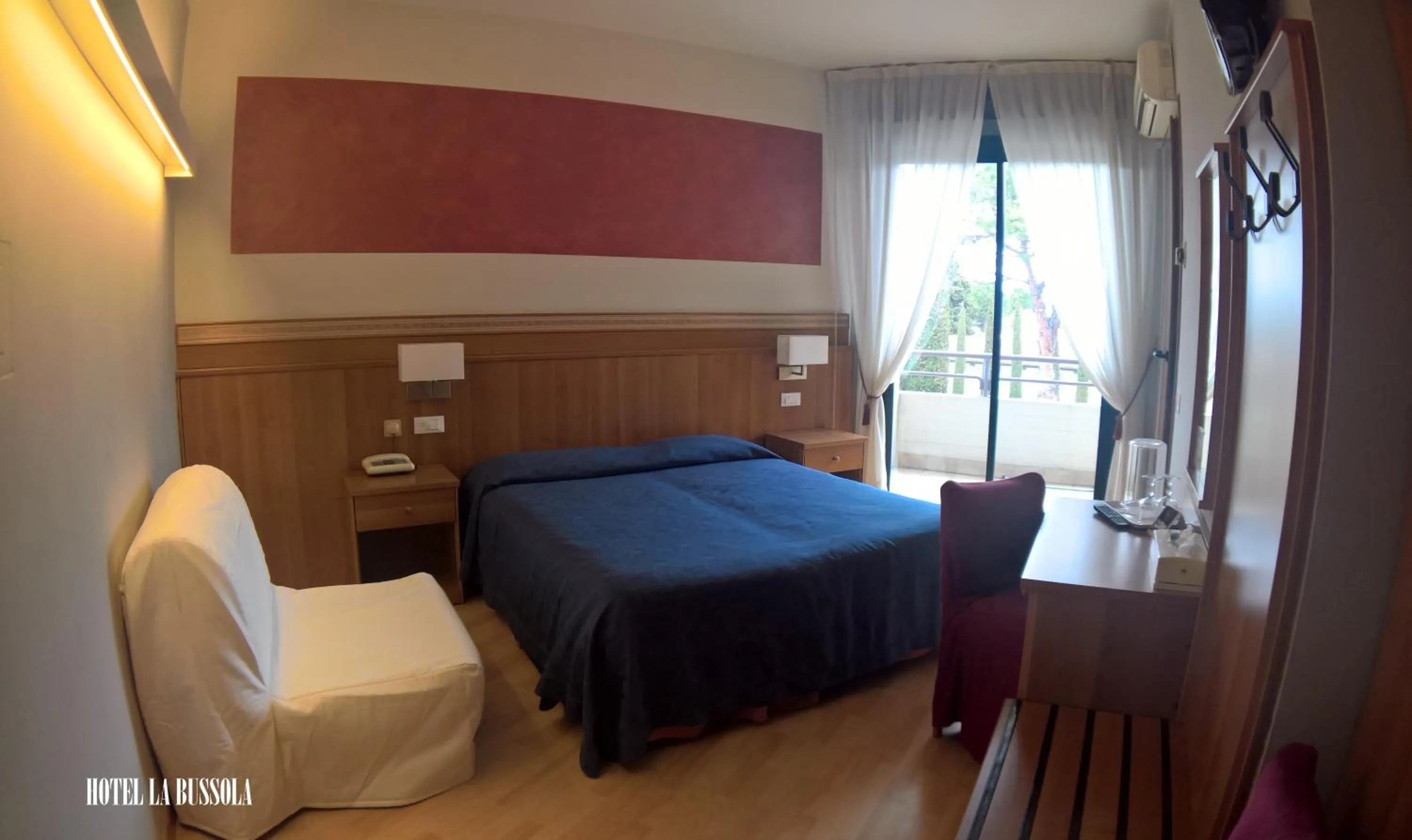 Photo of the whole room, Bed in Hotel La Bussola