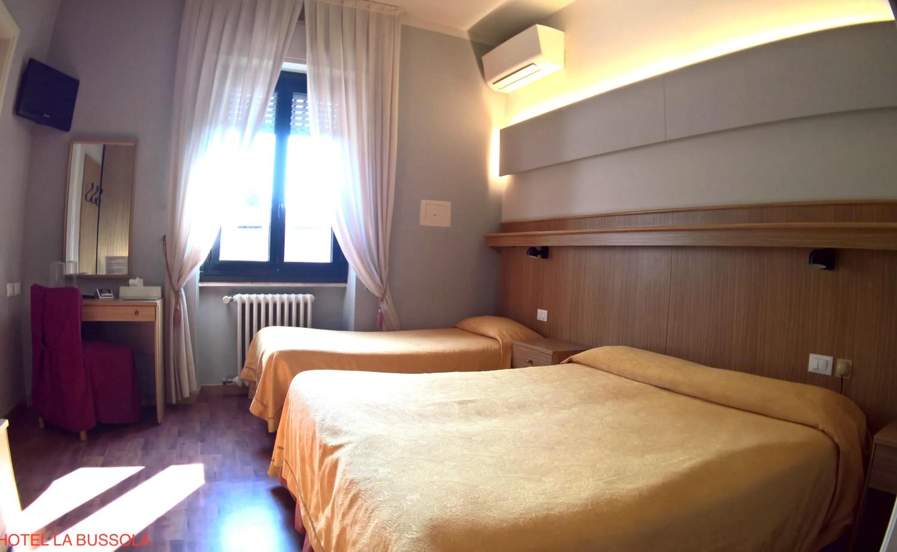 Bed in Hotel La Bussola