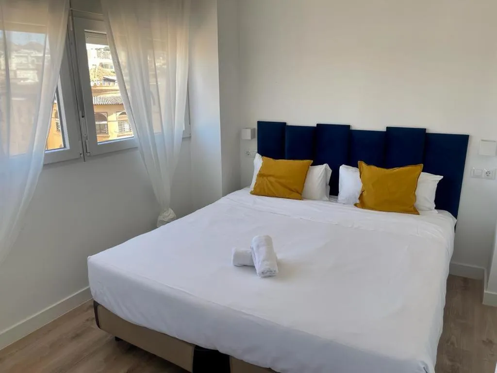 Bed in Malaga City Suites