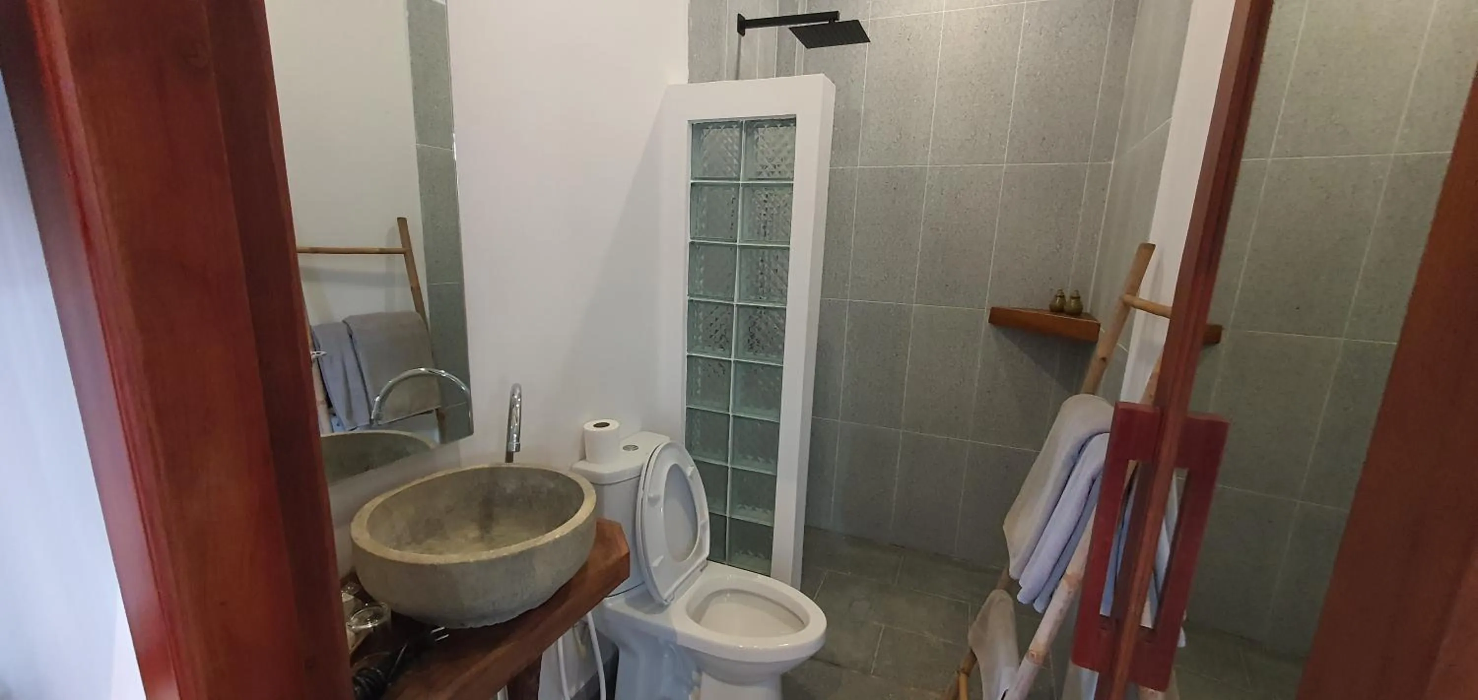 Bathroom in Sarina Hotel & Villa