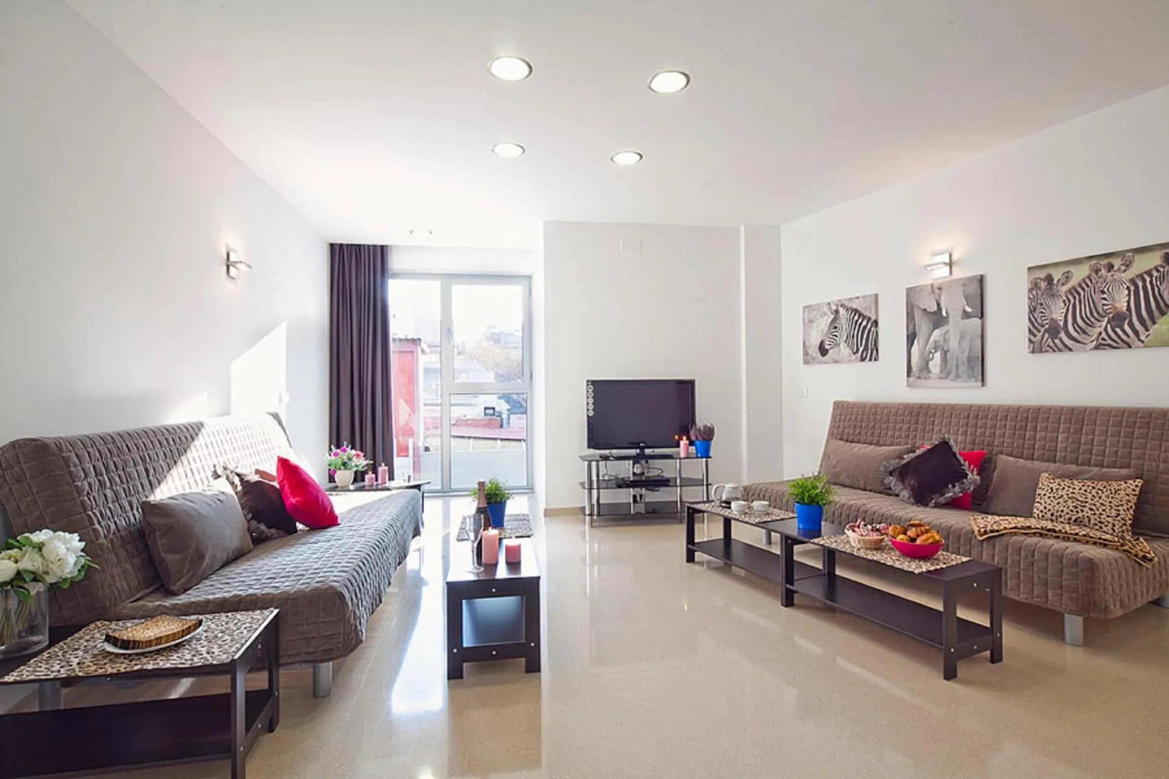 Living room in Charmsuites Nou Rambla