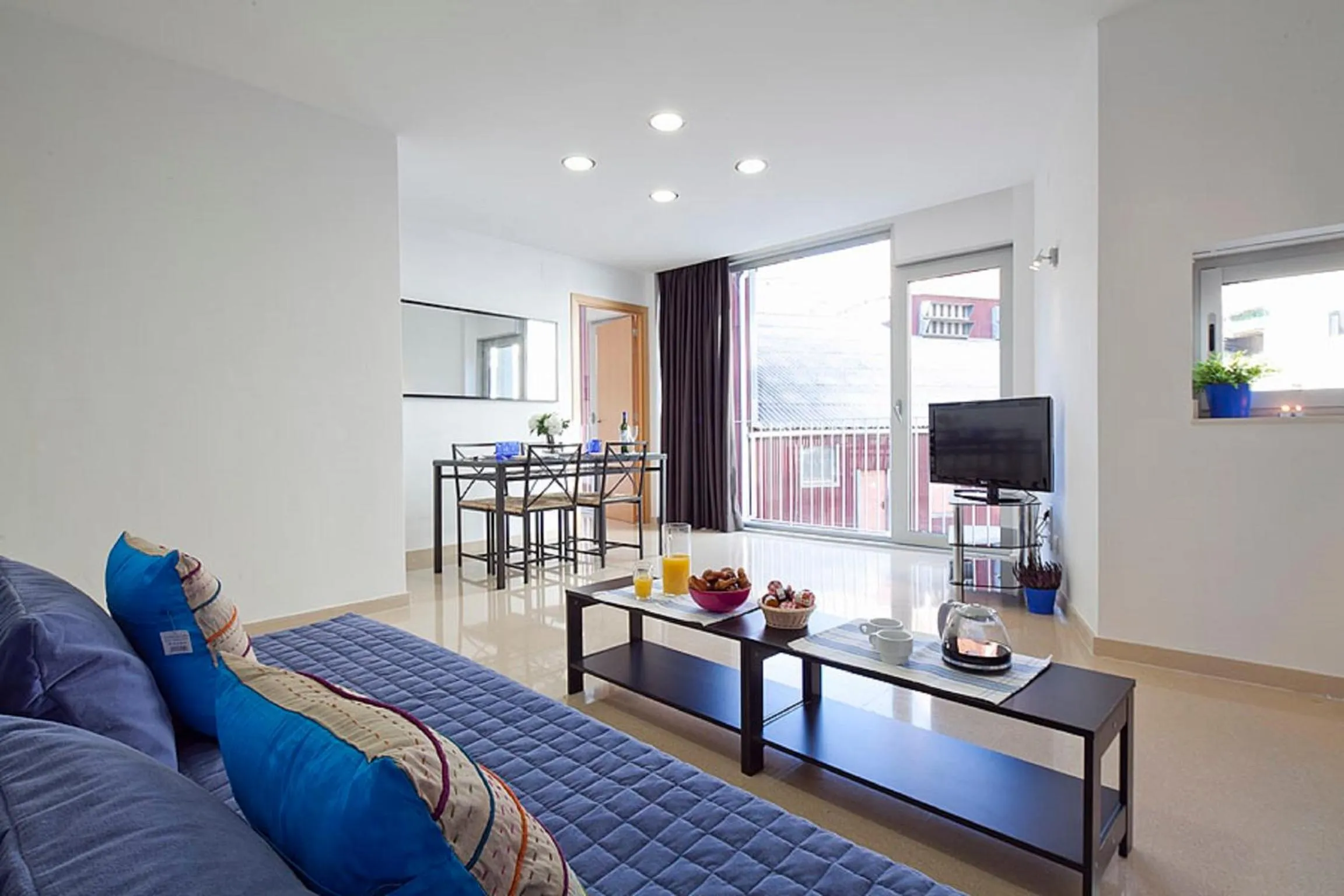 Living room in Charmsuites Nou Rambla