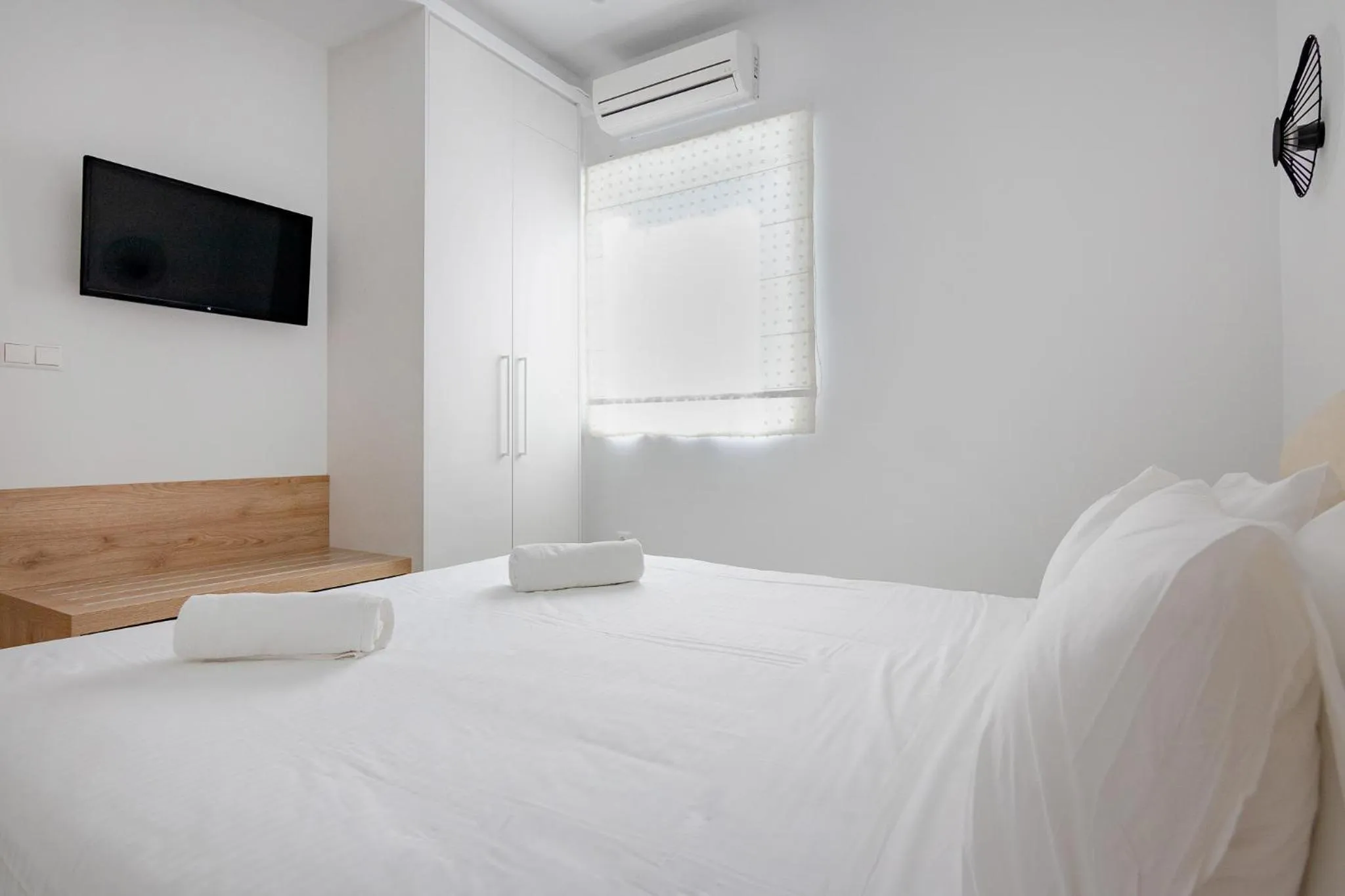 Bed in Peroulia Beach Houses