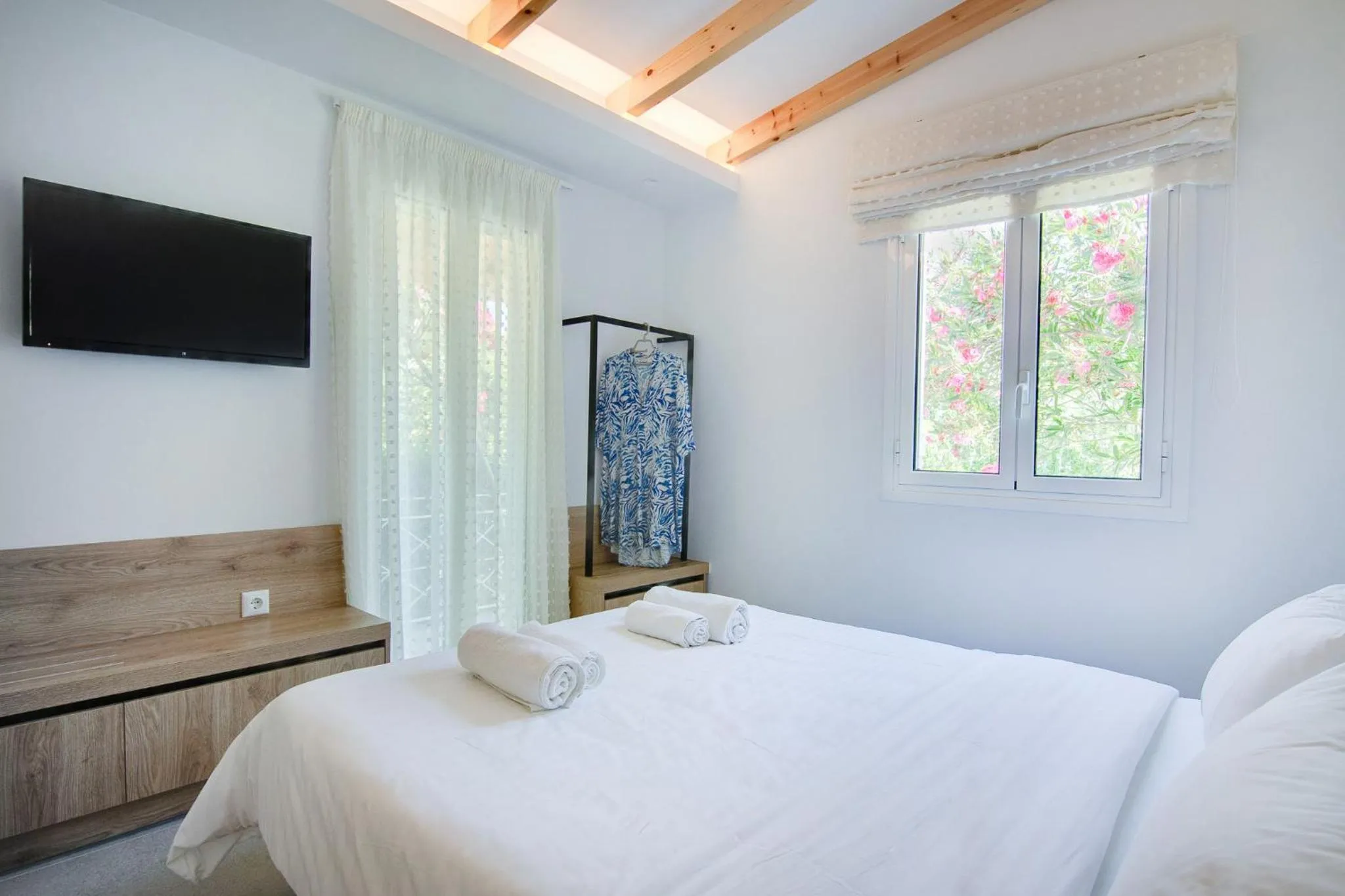 Bed in Peroulia Beach Houses