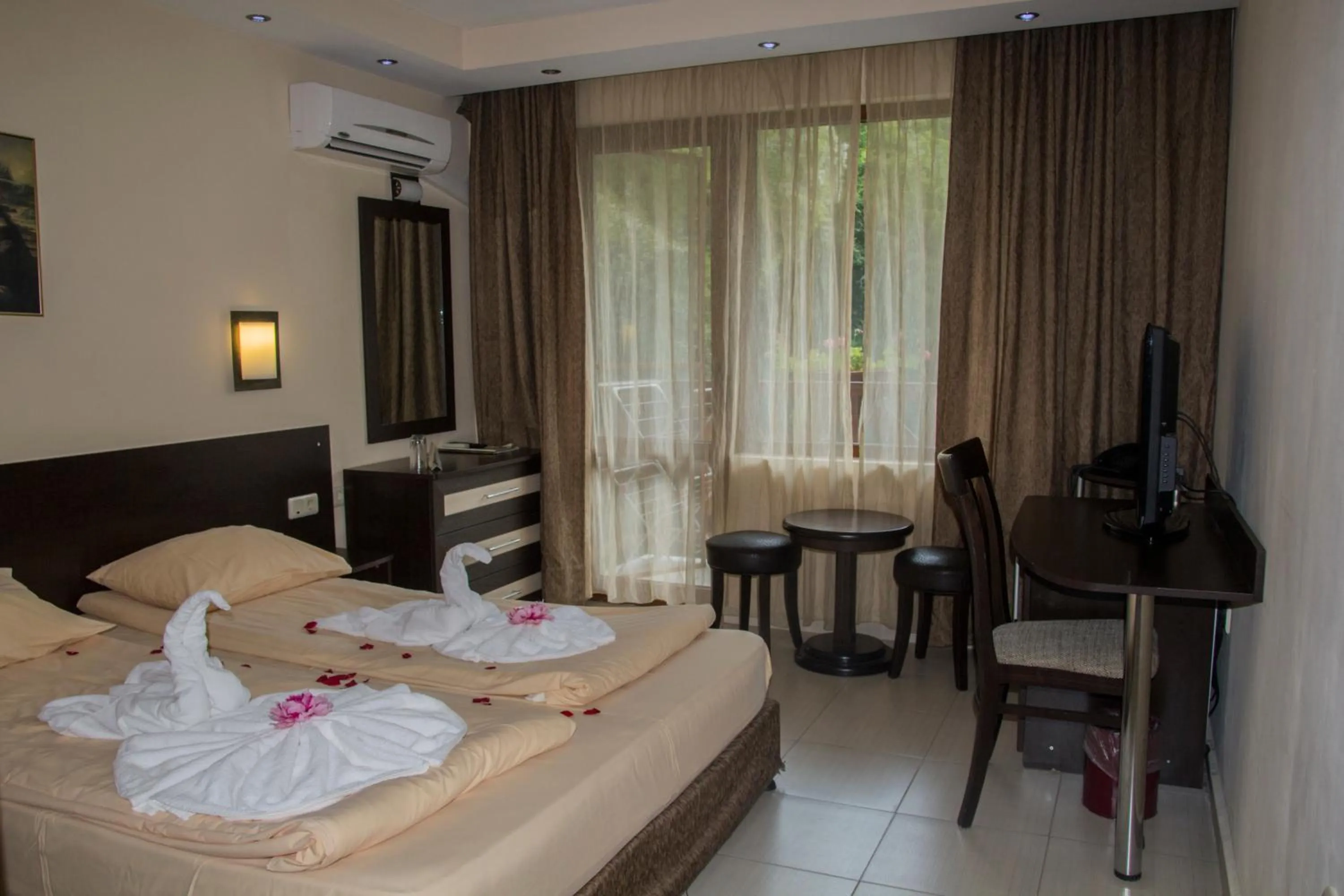 Bed in Family Hotel Delta