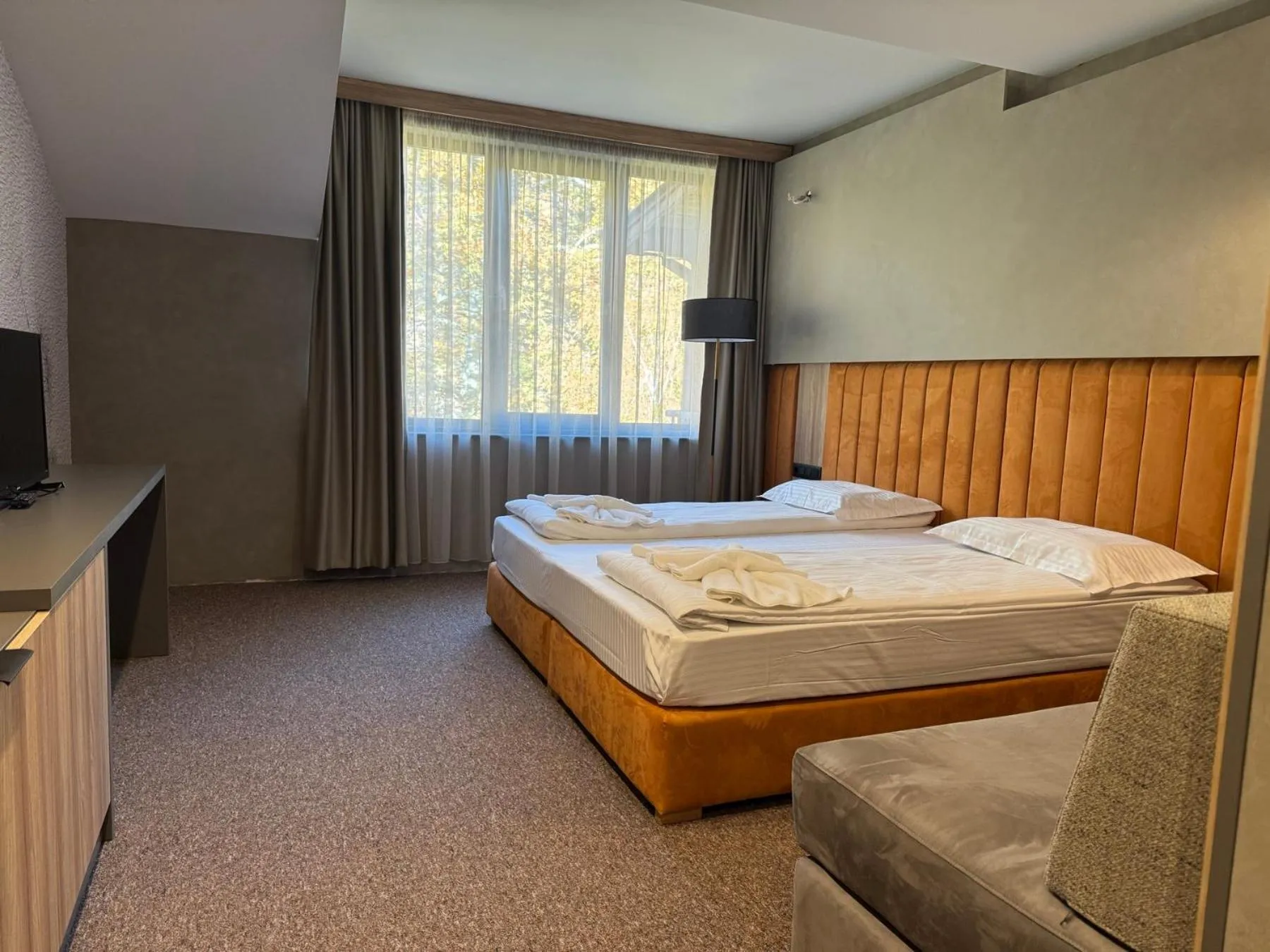 Bed in Family Hotel Delta