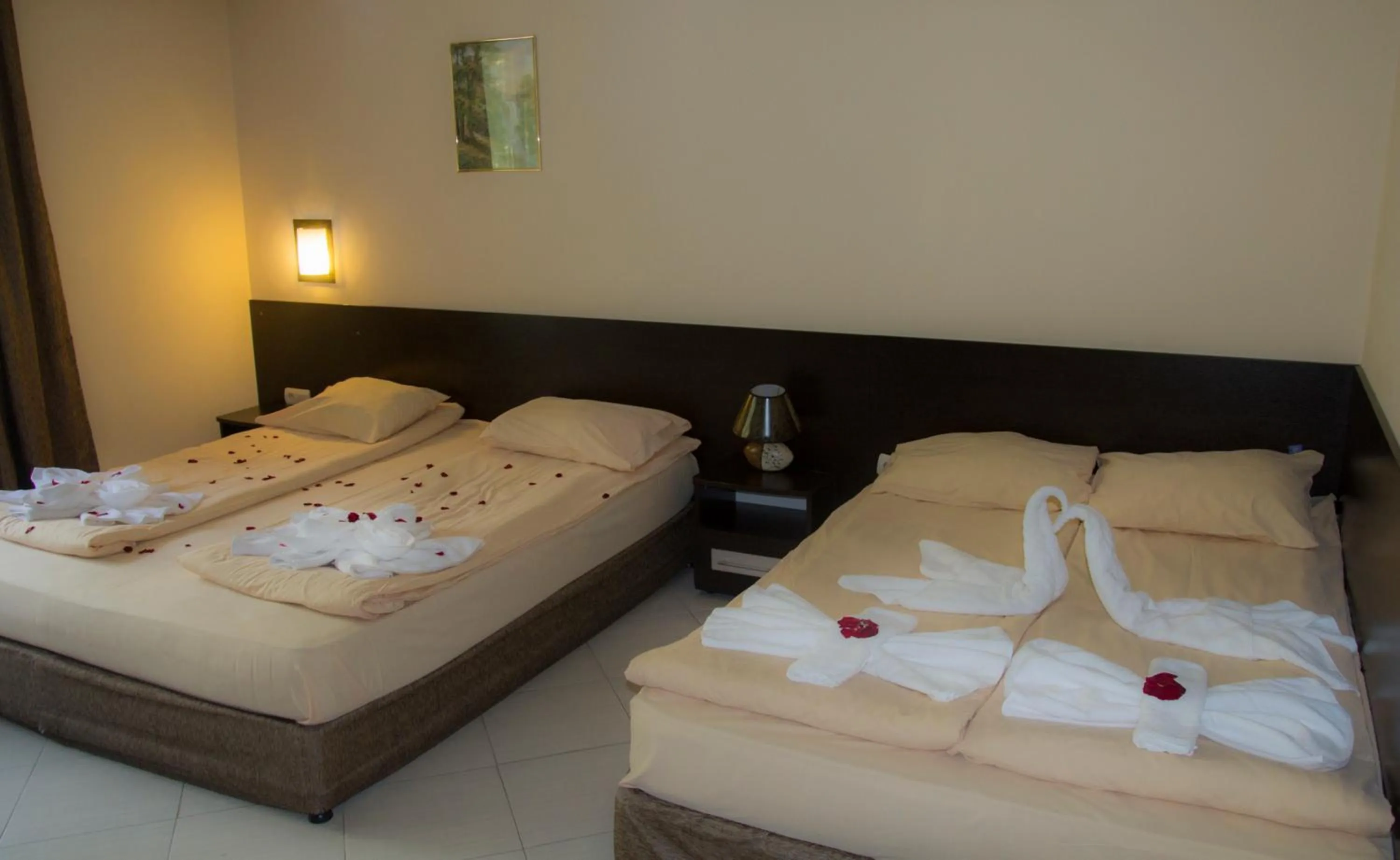 Bed in Family Hotel Delta