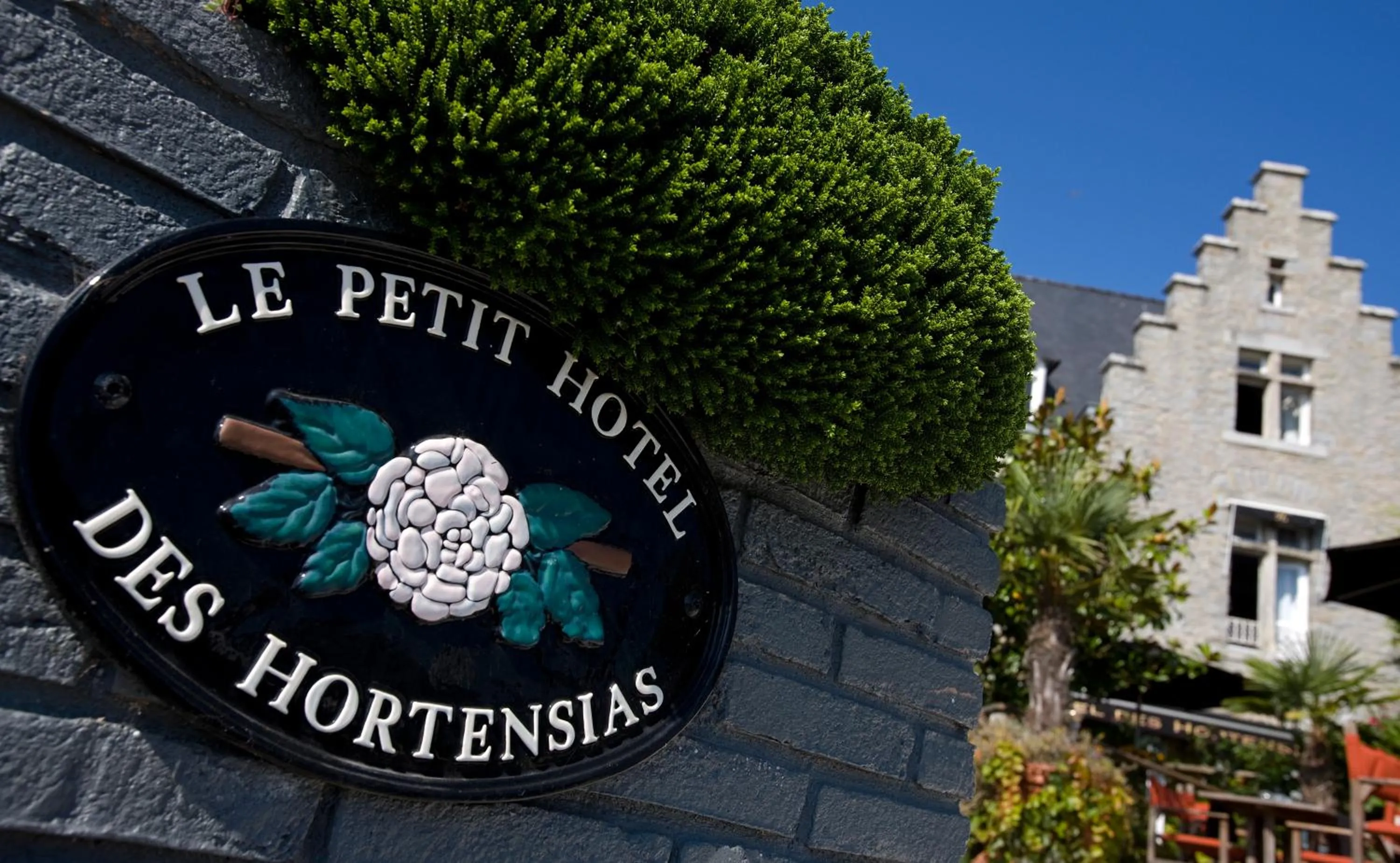 Property logo or sign in Le Petit Hôtel des Hortensias