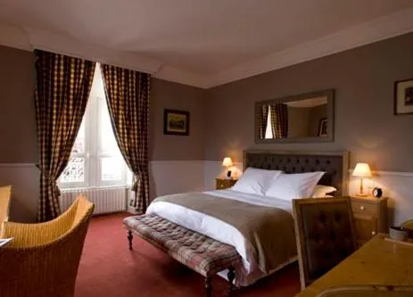 Bed in Le Petit Hôtel des Hortensias