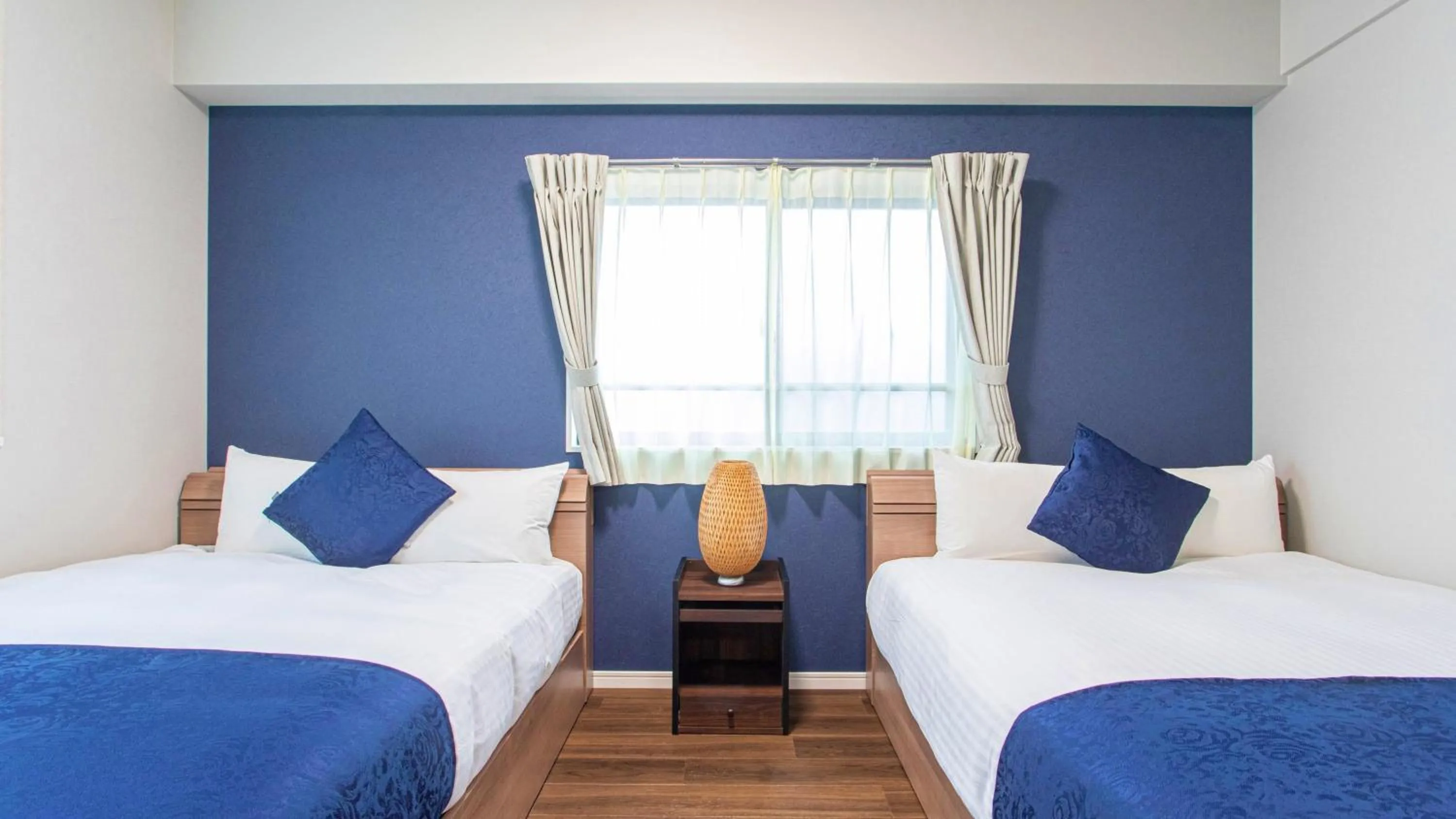 Bed in Dream Inn Hakata