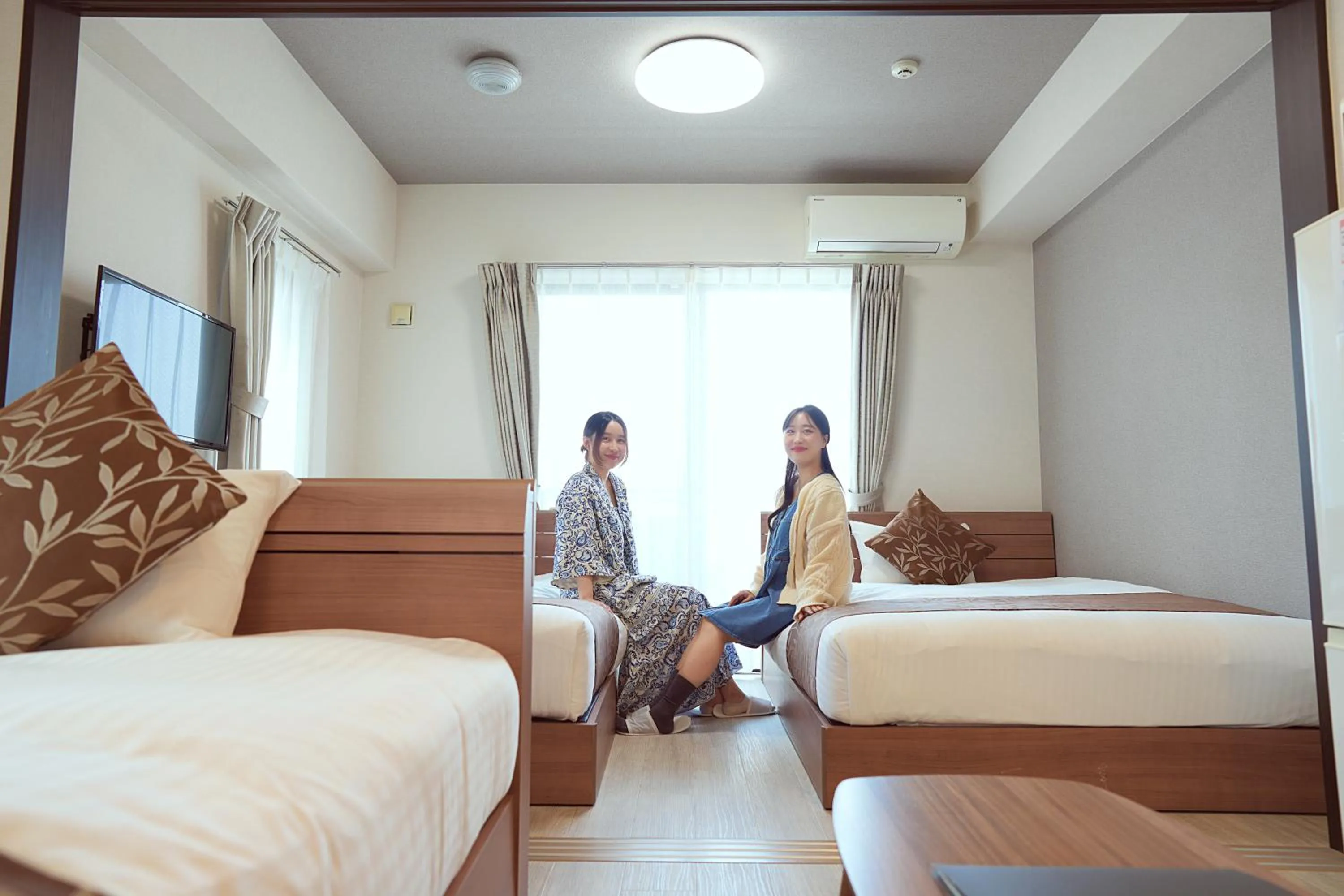 Bed in Dream Inn Hakata