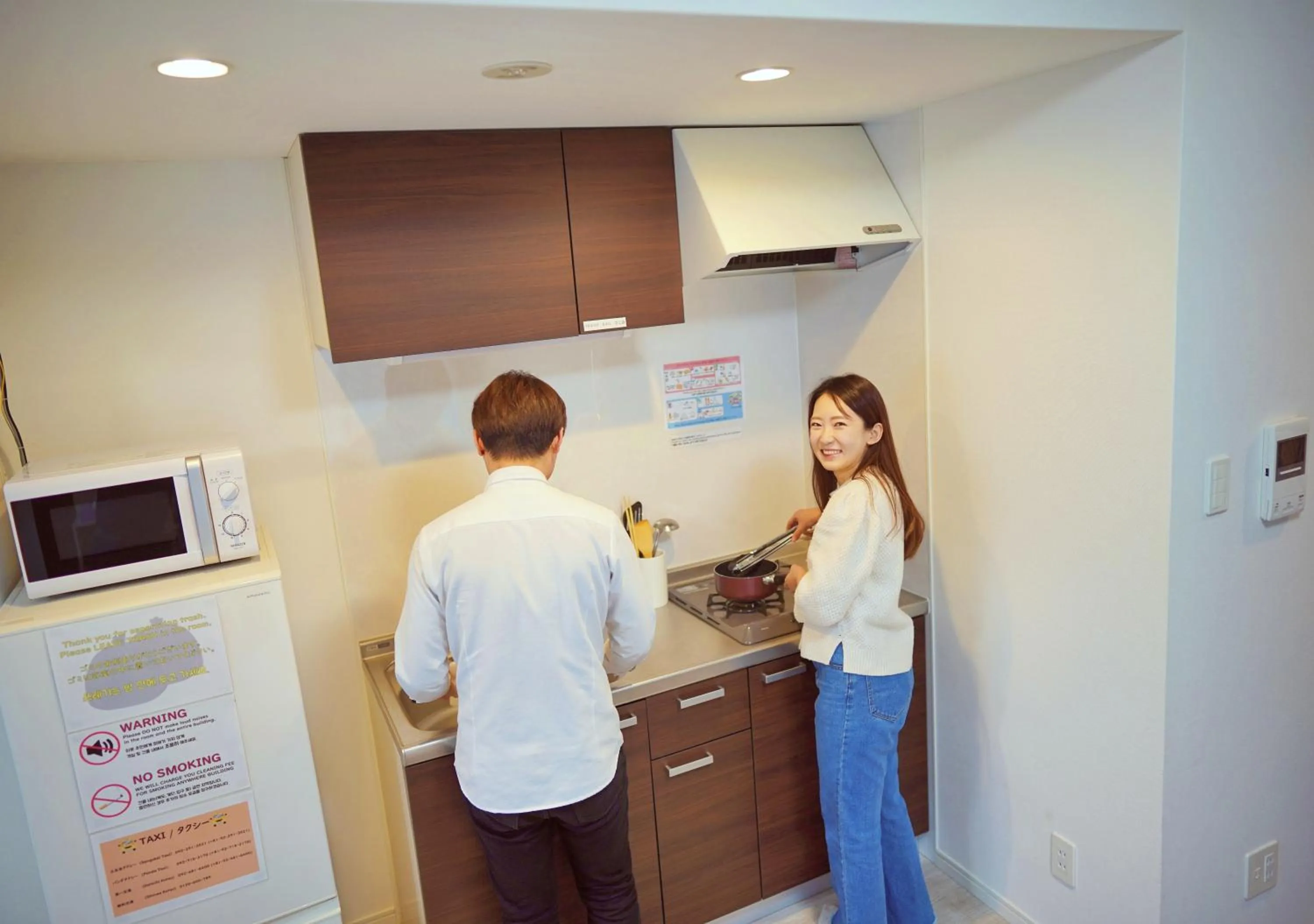 Kitchen or kitchenette in Dream Inn Hakata