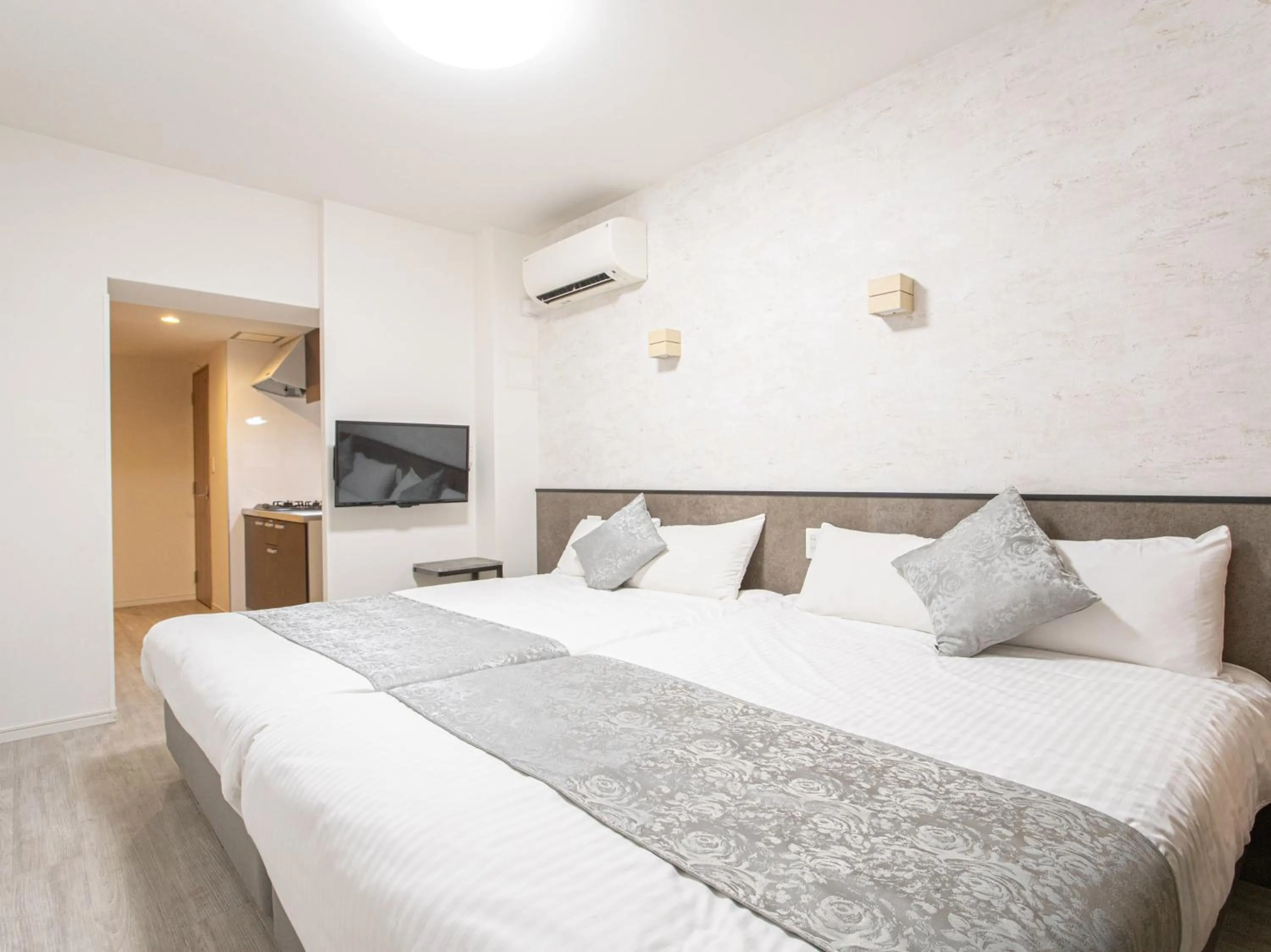 Bed in Dream Inn Hakata