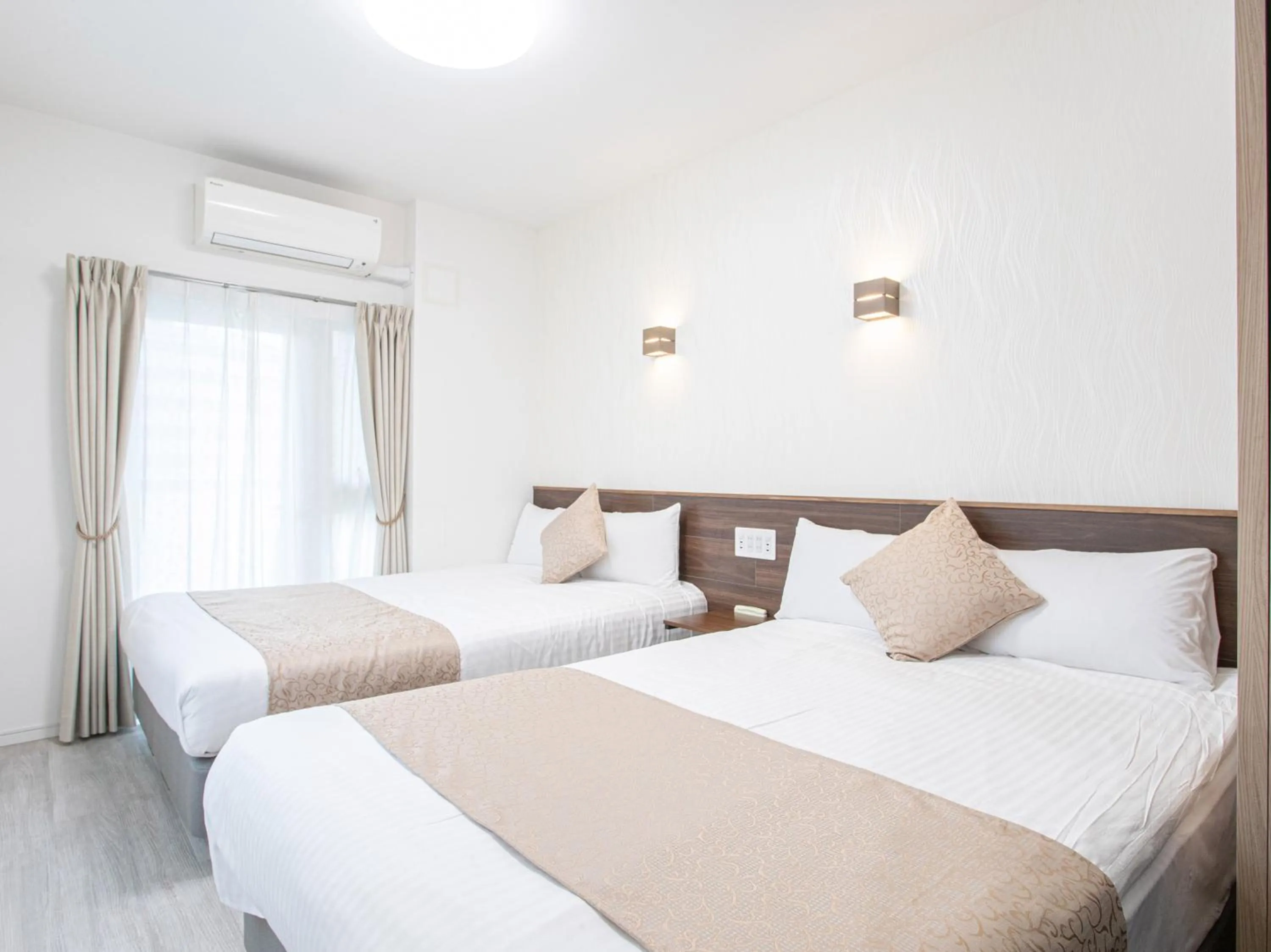 Photo of the whole room, Bed in Dream Inn Hakata