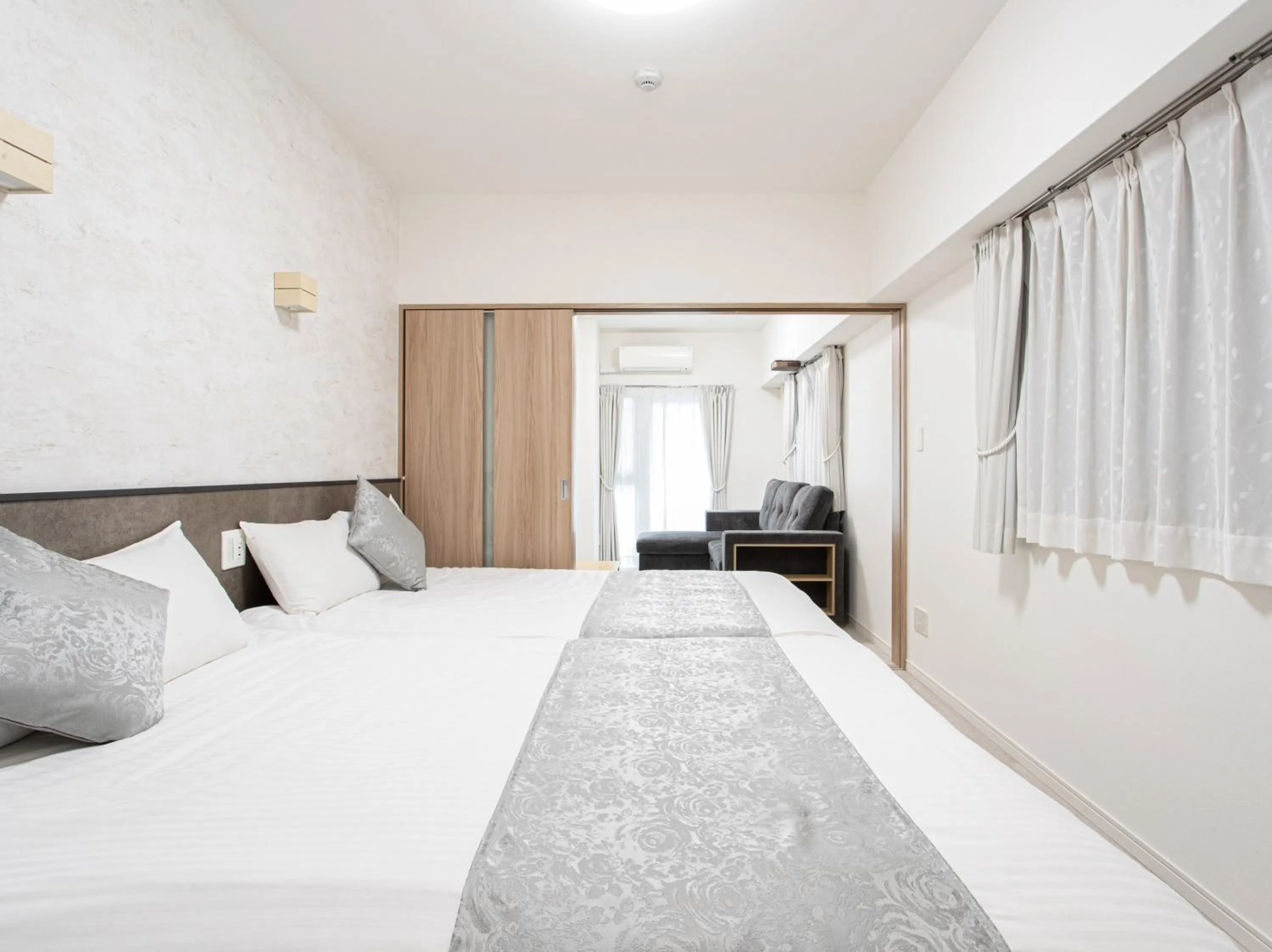 Bed in Dream Inn Hakata