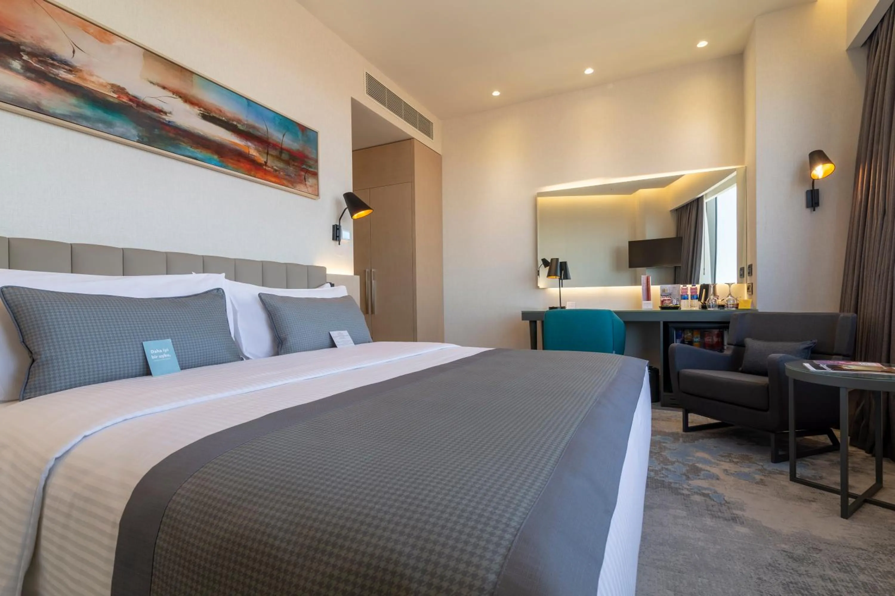 Photo of the whole room, Bed in Crowne Plaza Cappadocia - Nevsehir by IHG